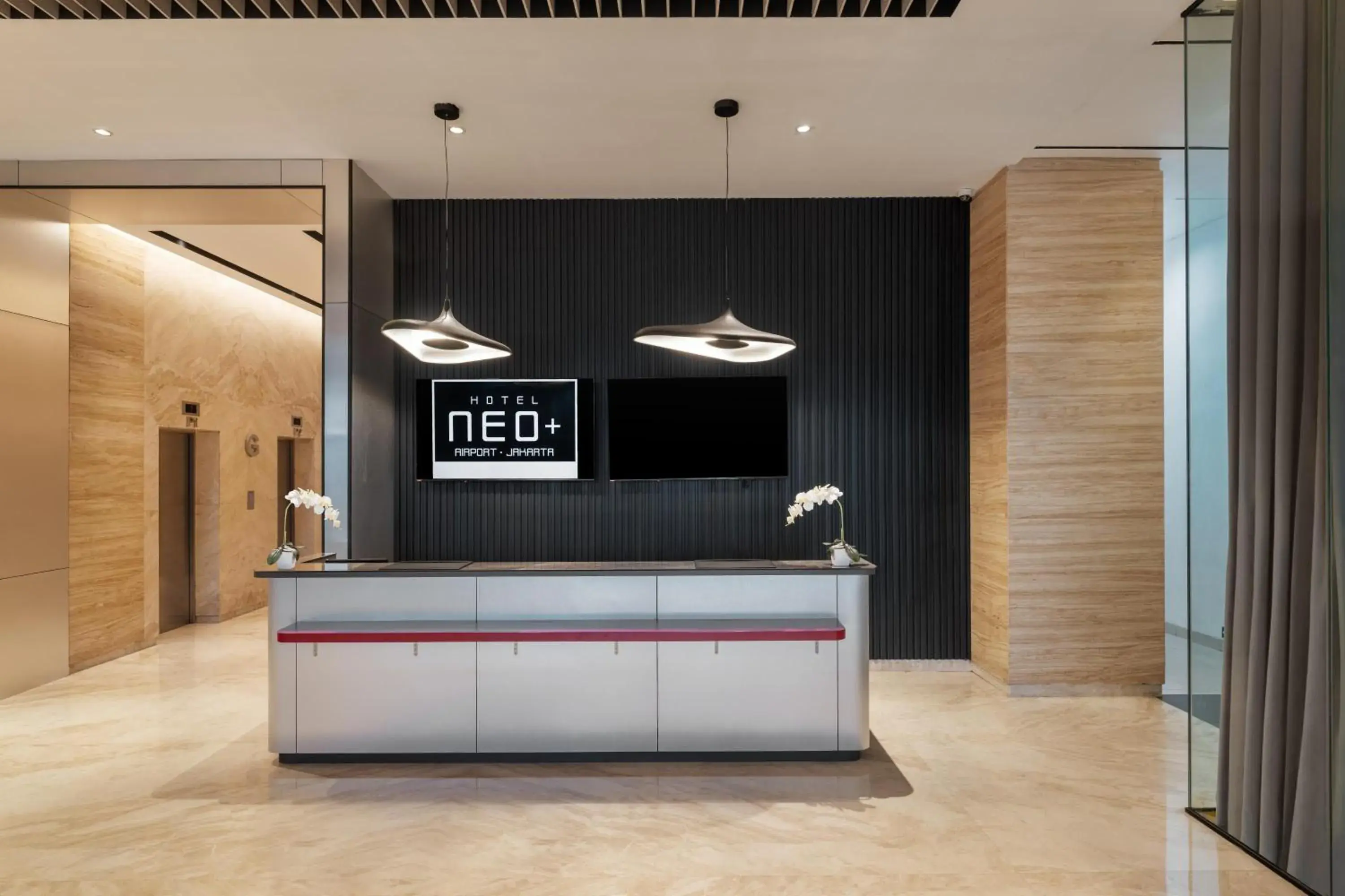 Lobby or reception in Hotel Neo Plus Airport Jakarta Lobby or reception in Hotel Neo Plus Airport Jakarta