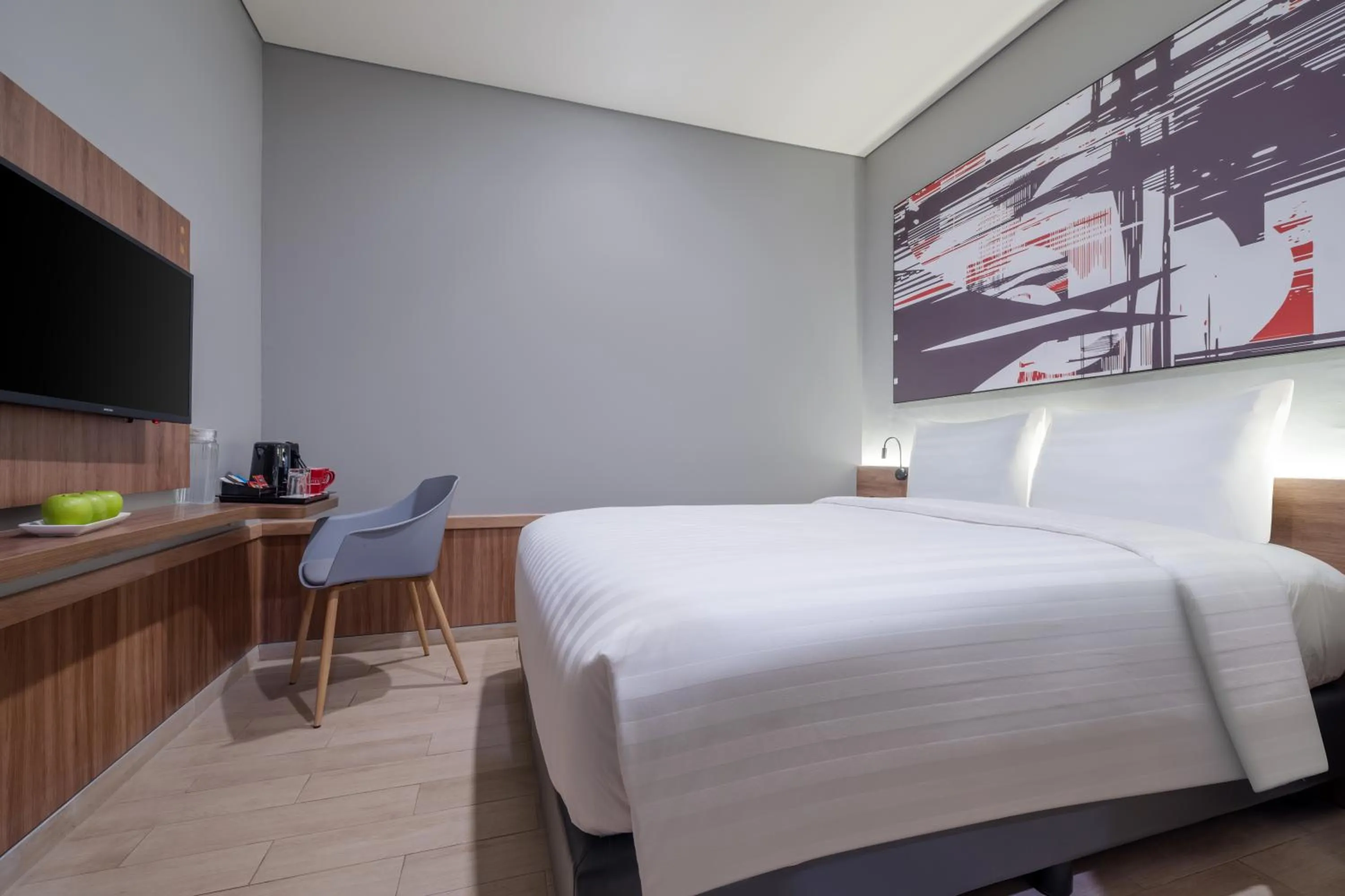 Bedroom in Hotel Neo Plus Airport Jakarta