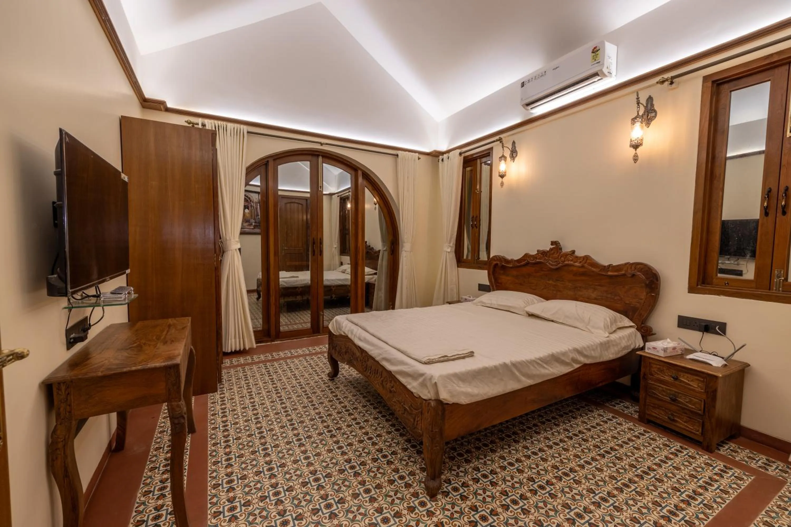 Bed in Ishaan Holiday Home