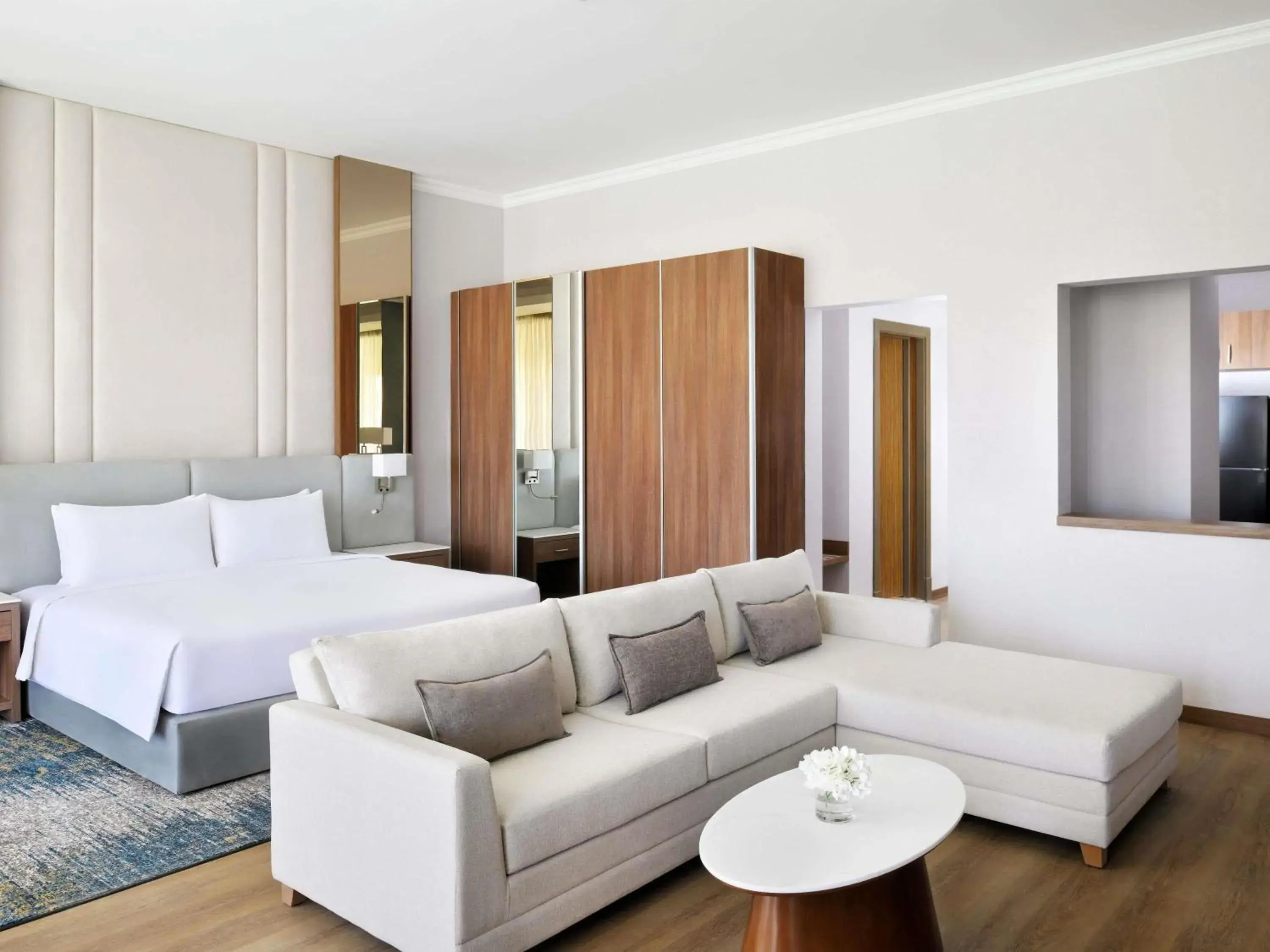 Junior Queen Suite with Sofa Bed and Kitchen in Mövenpick Hotel Waad Al Shamal Junior Queen Suite with Sofa Bed and Kitchen in Mövenpick Hotel Waad Al Shamal