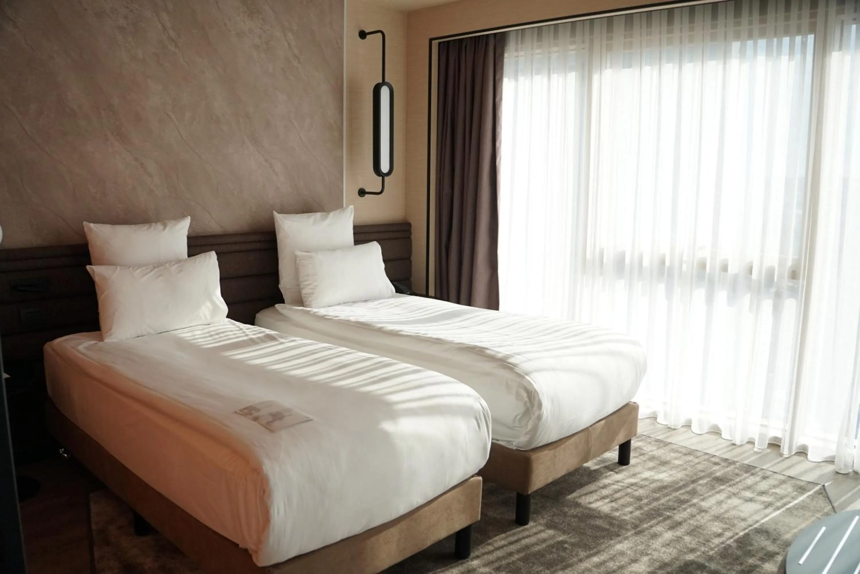 Bed in Novotel Istanbul Bomonti