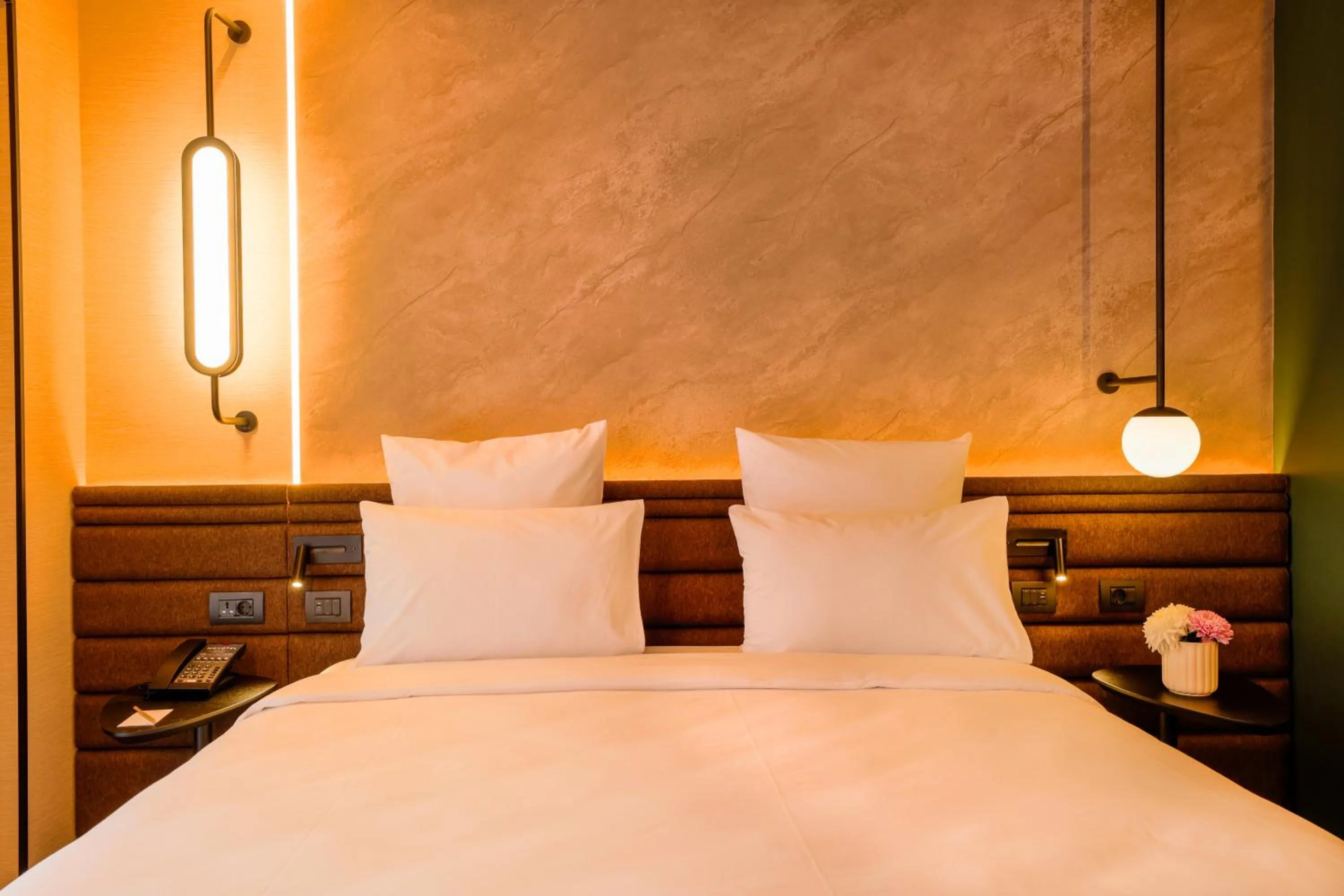 Bed in Novotel Istanbul Bomonti