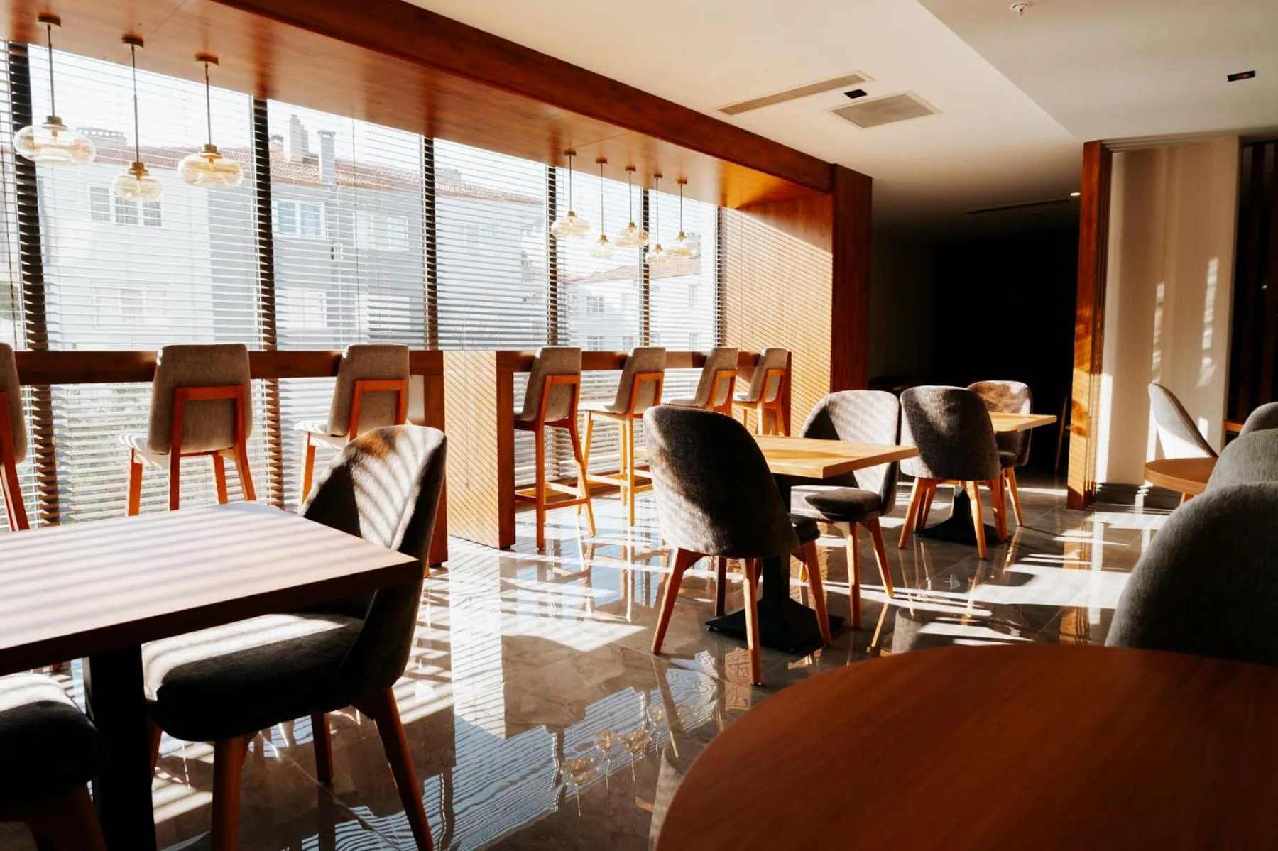 Communal lounge/ TV room in The Emporia Hotel