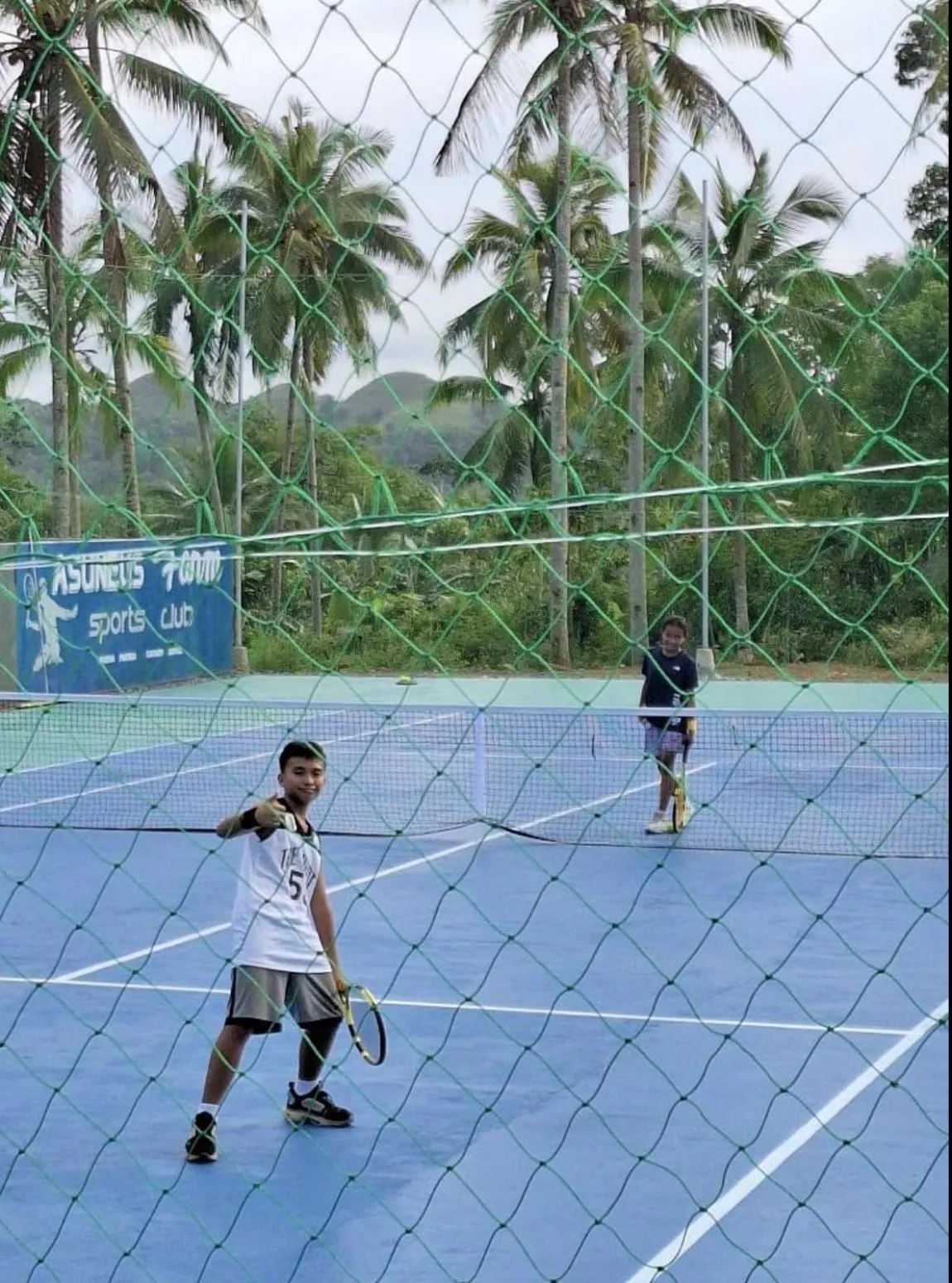 Tennis court in AsunEus Farm