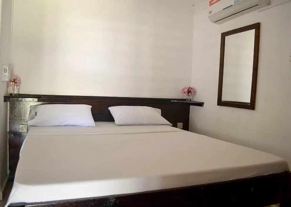 Bed in The New Big Tree Beach Resort