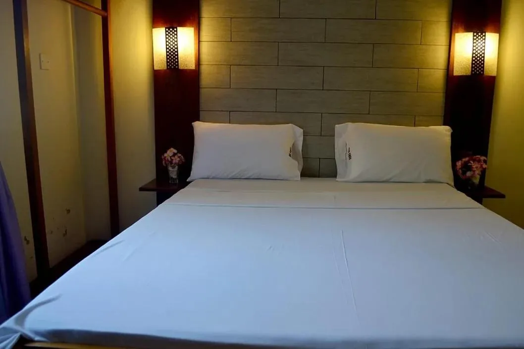 Bed in The New Big Tree Beach Resort