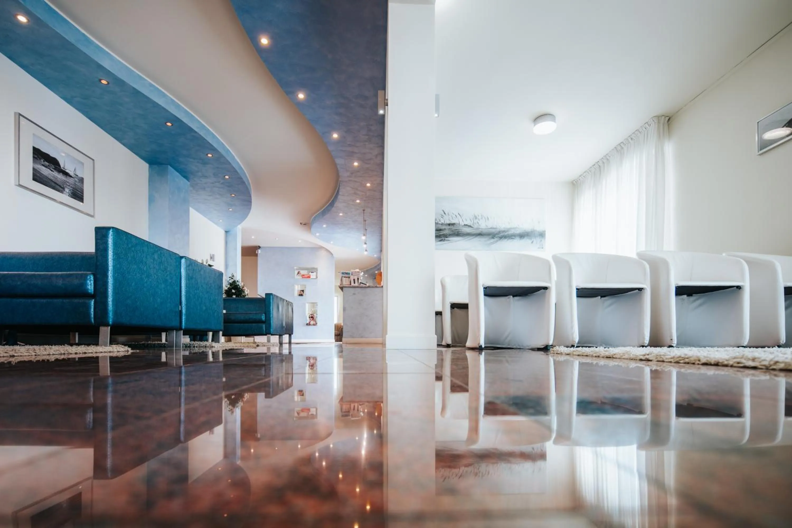 Communal lounge/ TV room in Hotel La Bussola