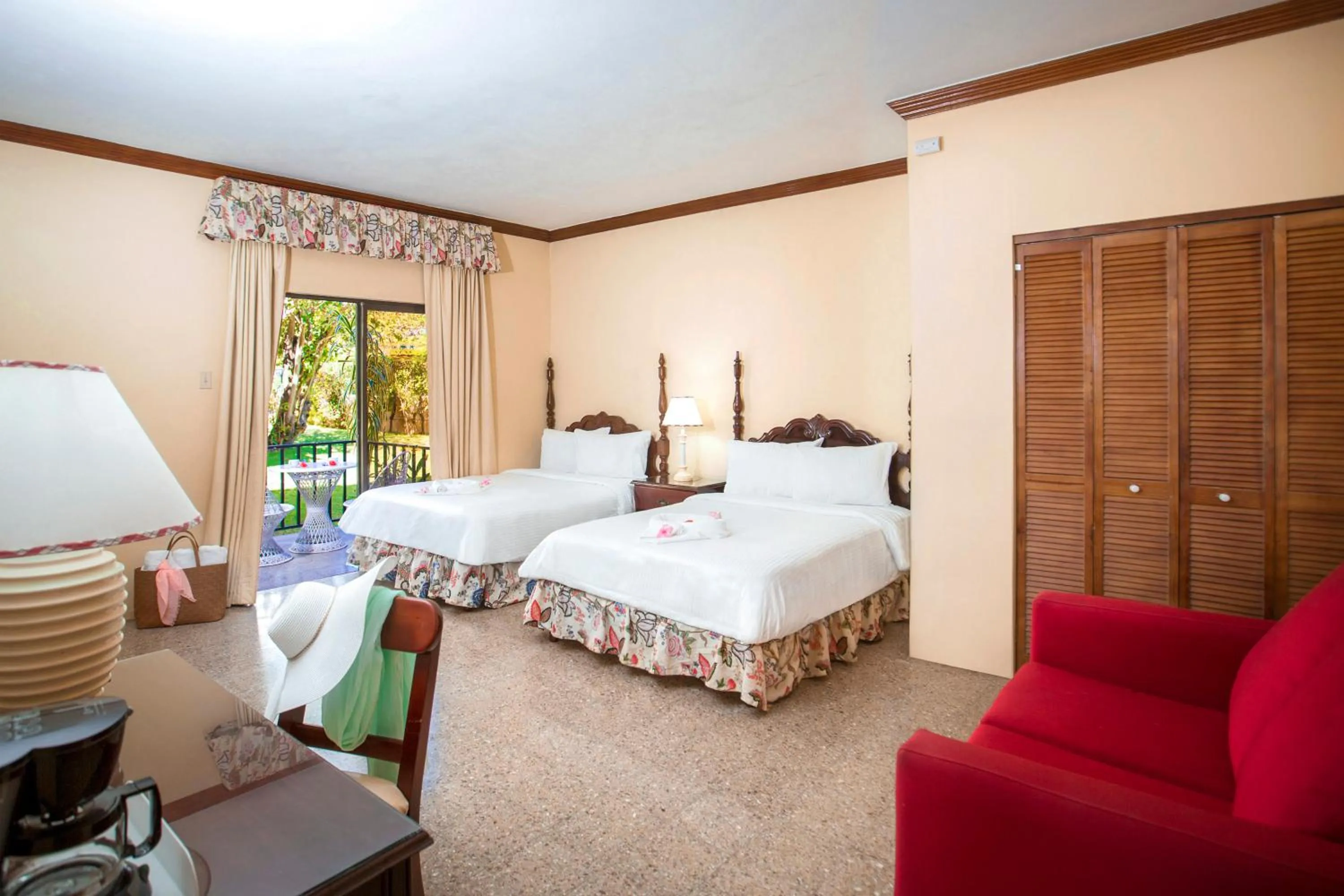 Bed in Rooms On The Beach Negril