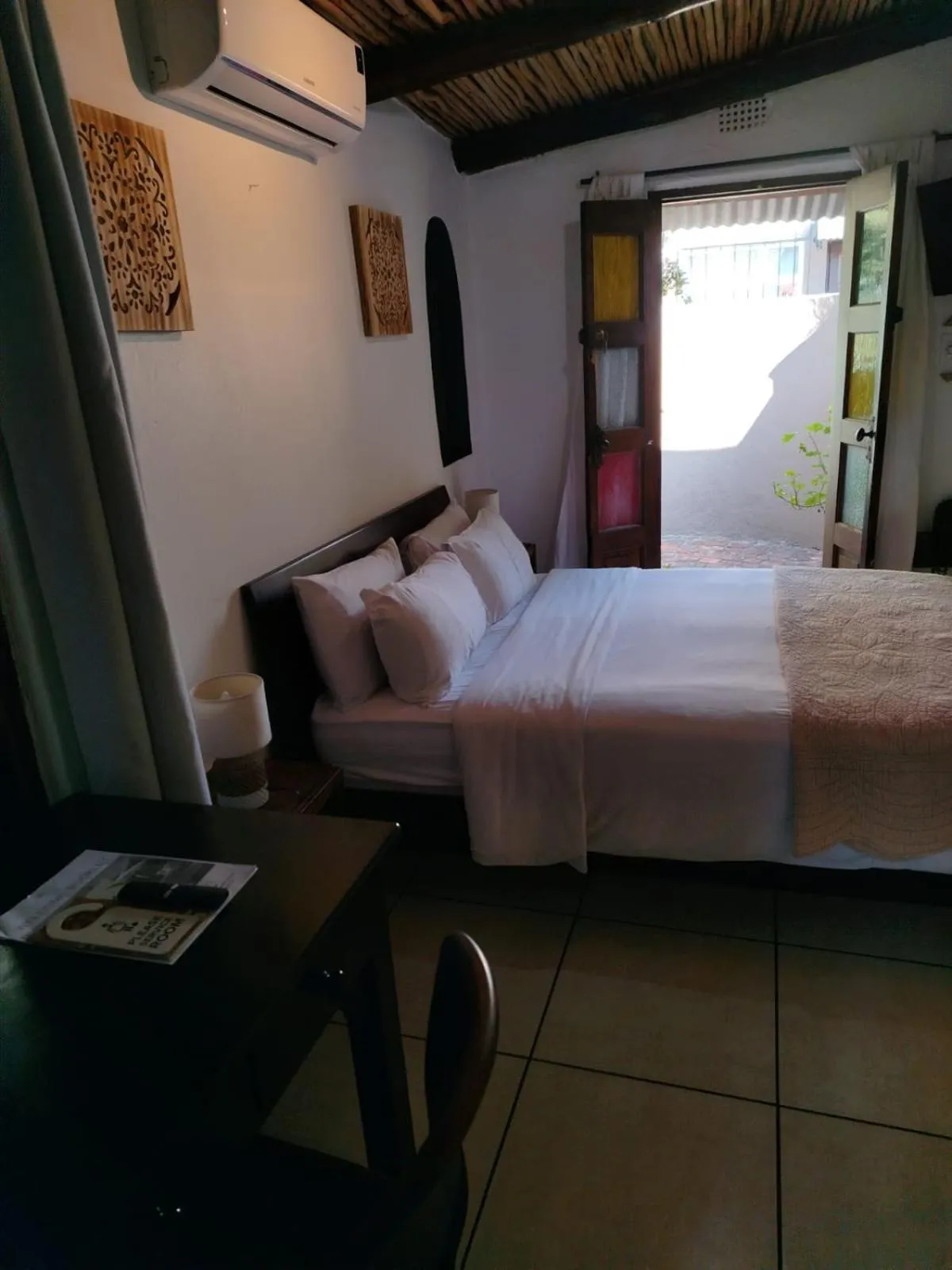 Photo of the whole room, Bed in 84 on Fourth Guest House