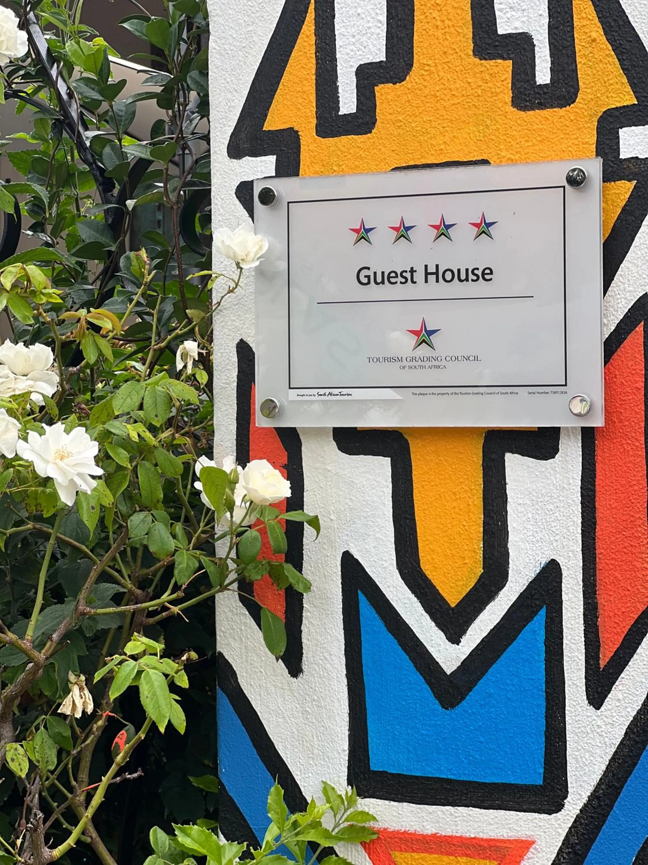 Logo/Certificate/Sign in 84 on Fourth Guest House