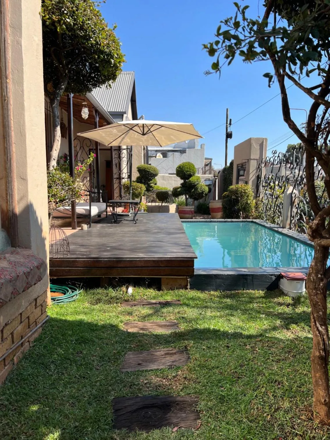 Swimming pool in 84 on Fourth Guest House