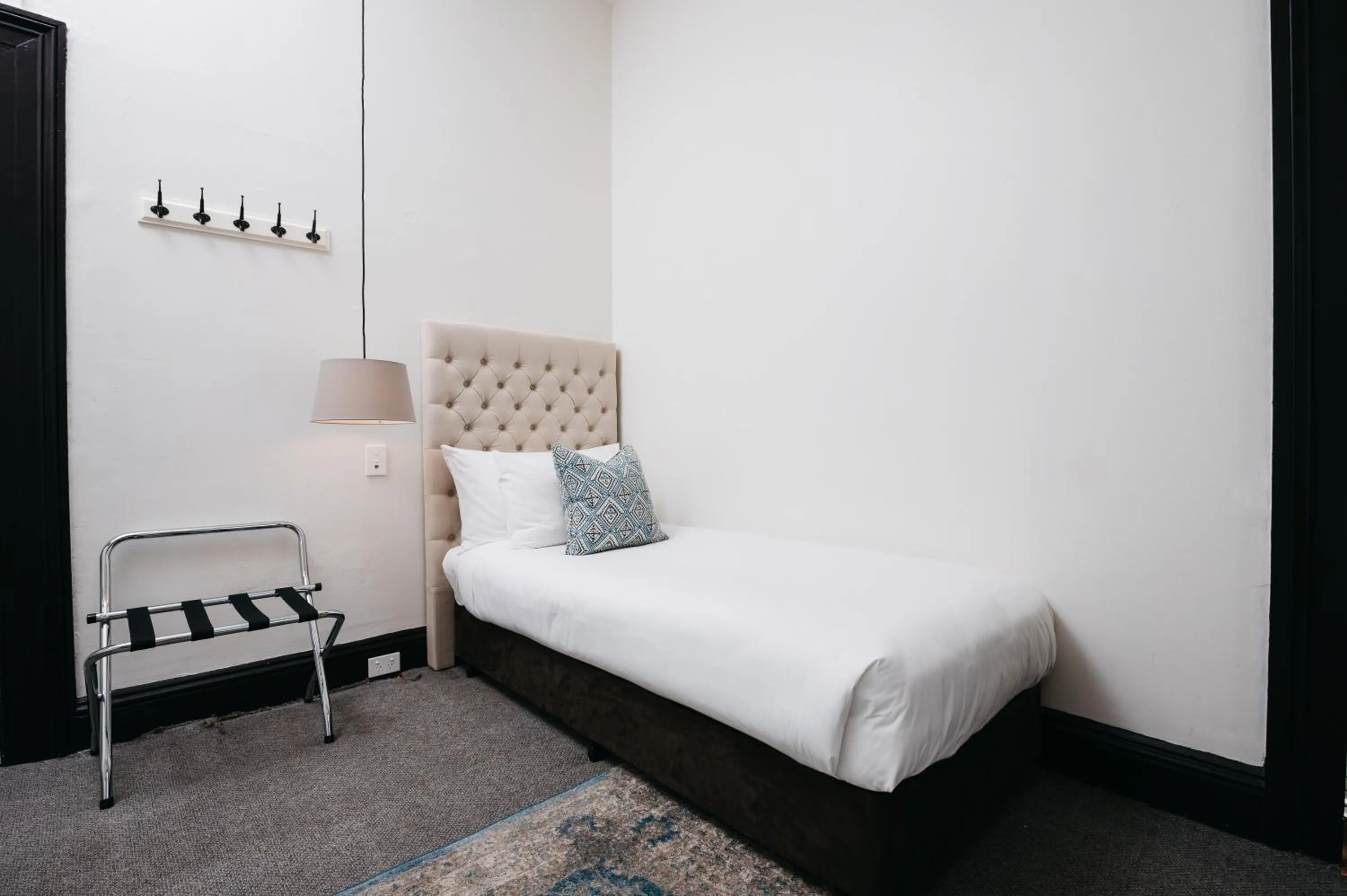 Bed in Hotel Etico at Mount Victoria Manor