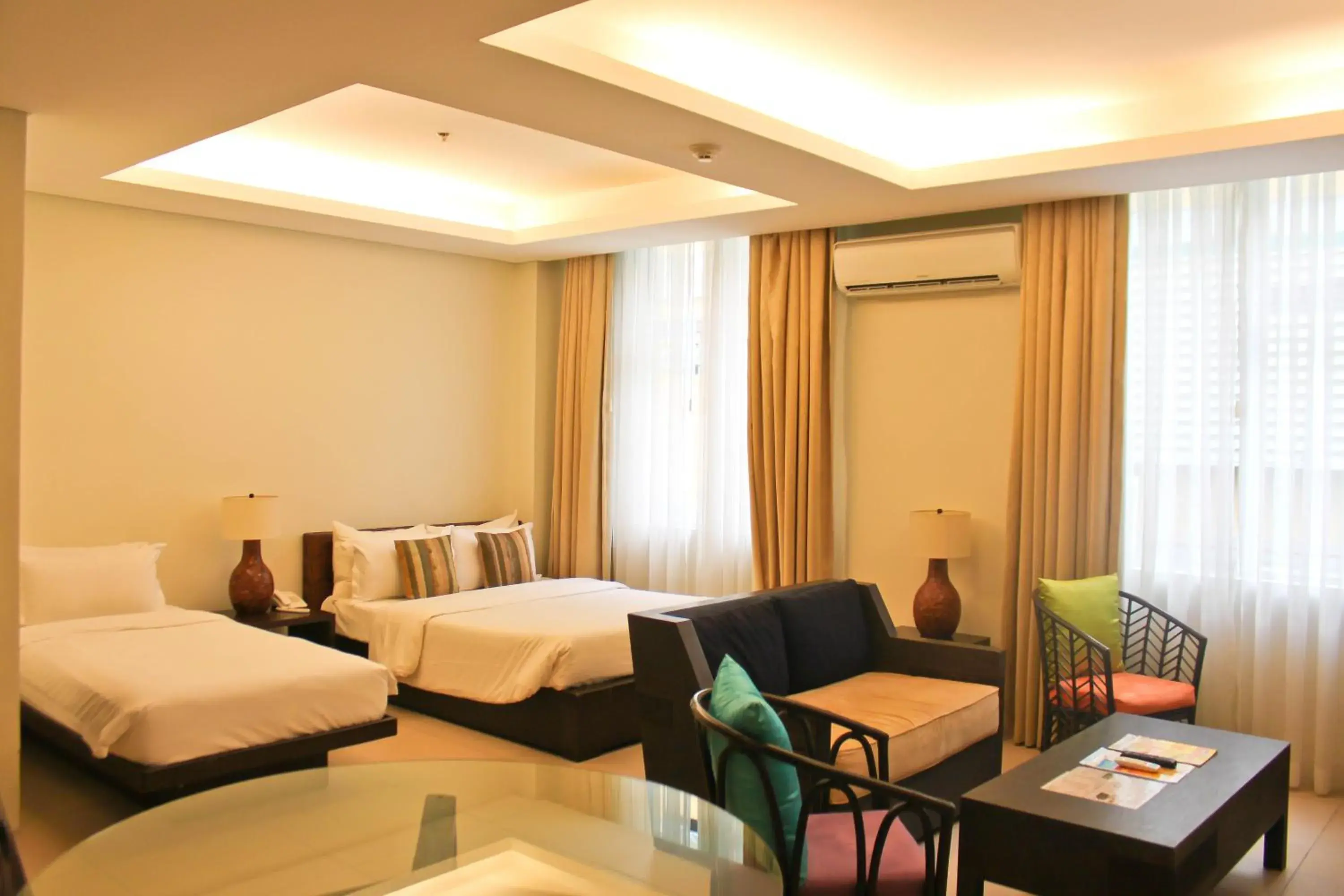 Photo of the whole room, Bed in Azia Suites and Residences Photo of the whole room, Bed in Azia Suites and Residences