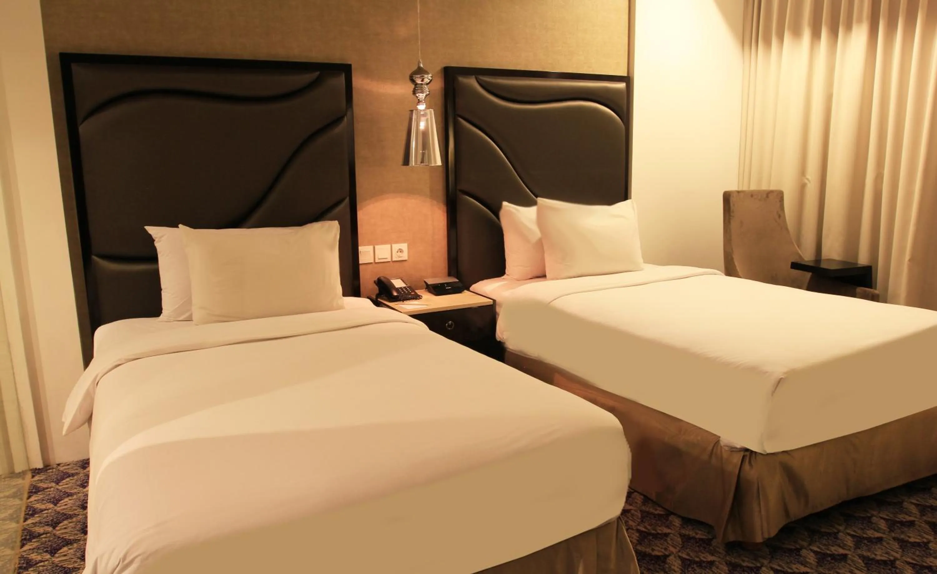 Bed in Aston Bellevue Radio Dalam