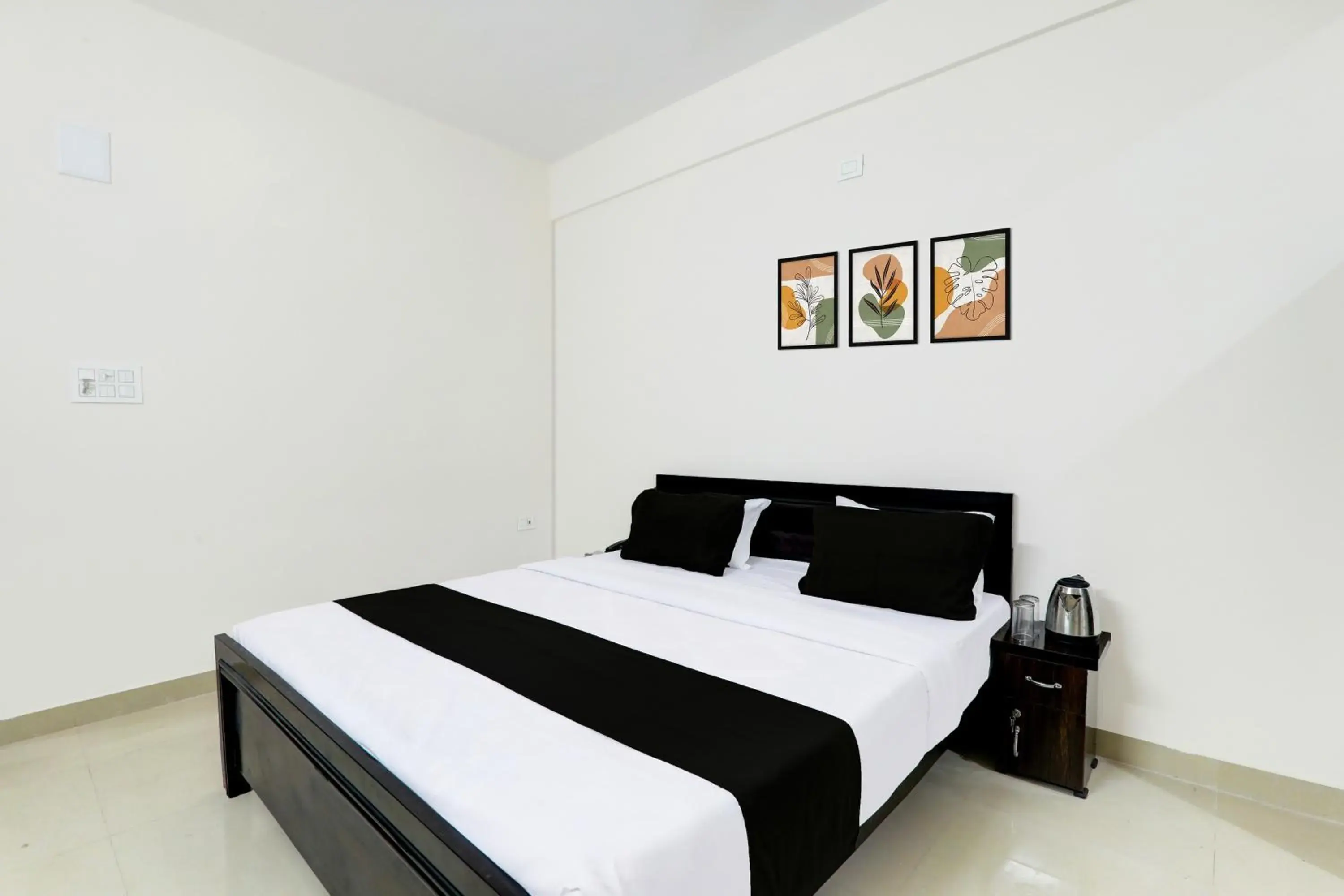 Bedroom, Bed in Super Hotel O Kadam Ghat Near Ashok RajPath Bedroom, Bed in Super Hotel O Kadam Ghat Near Ashok RajPath