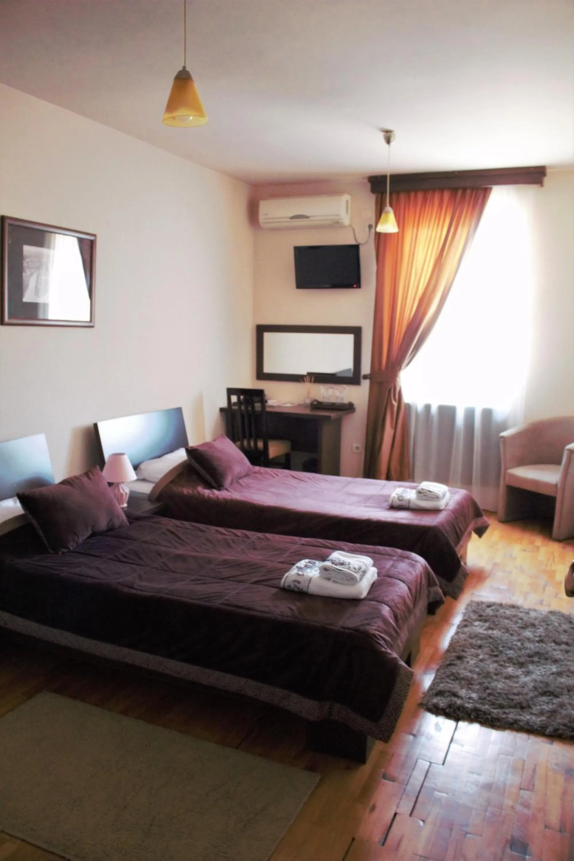 Bed in Garni Hotel City