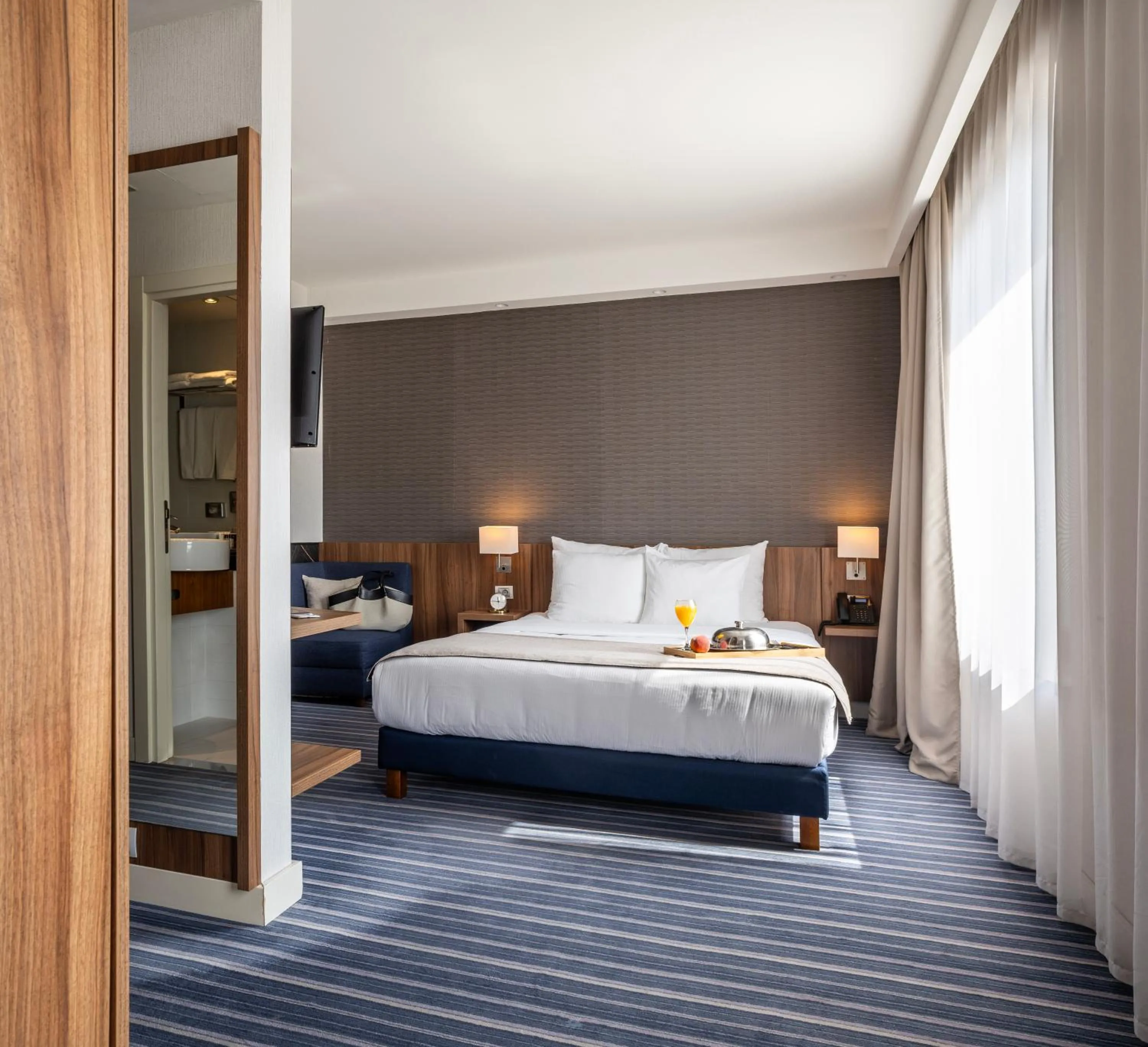 Bed in Nobel Palace Hotel