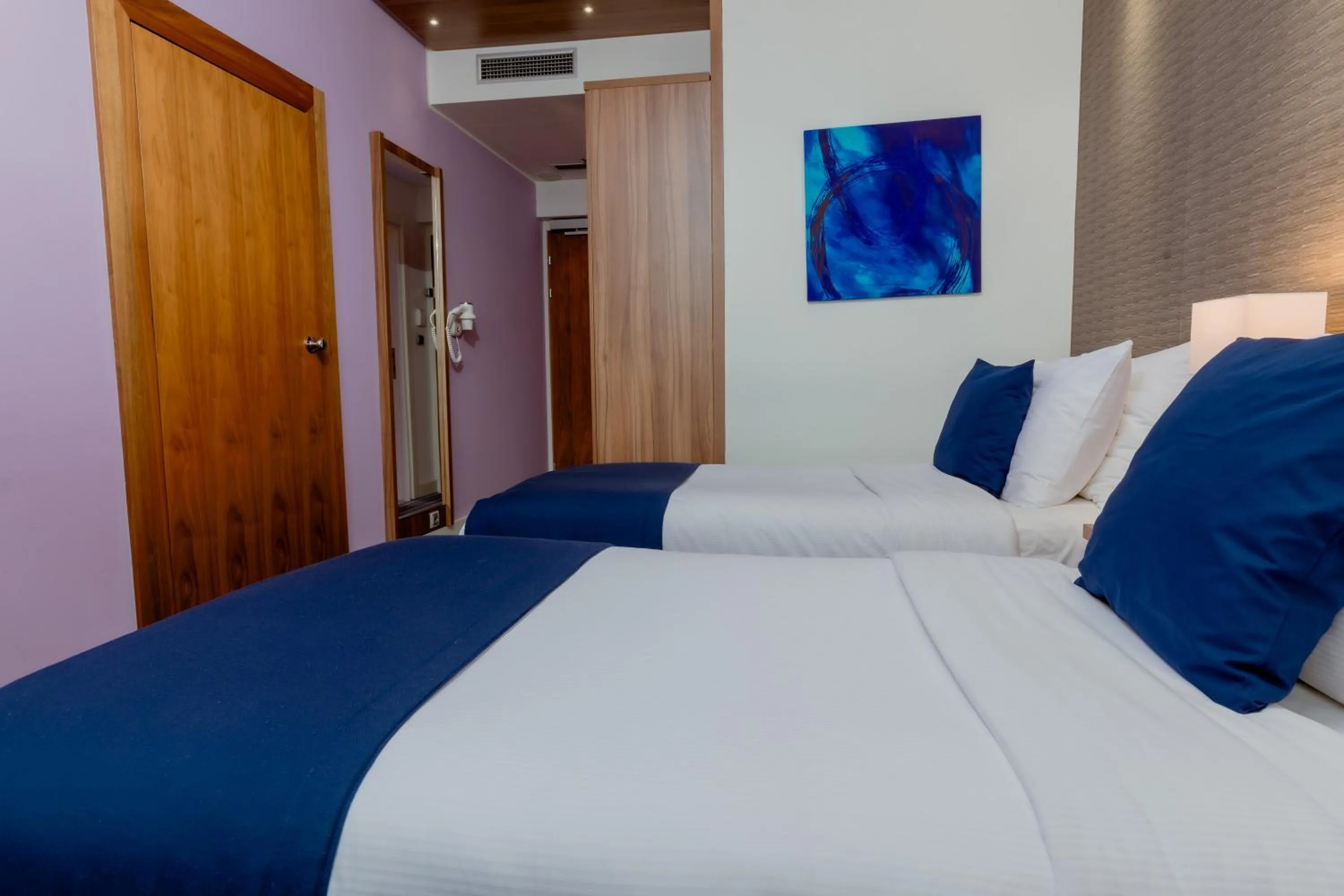 Bed in Nobel Palace Hotel