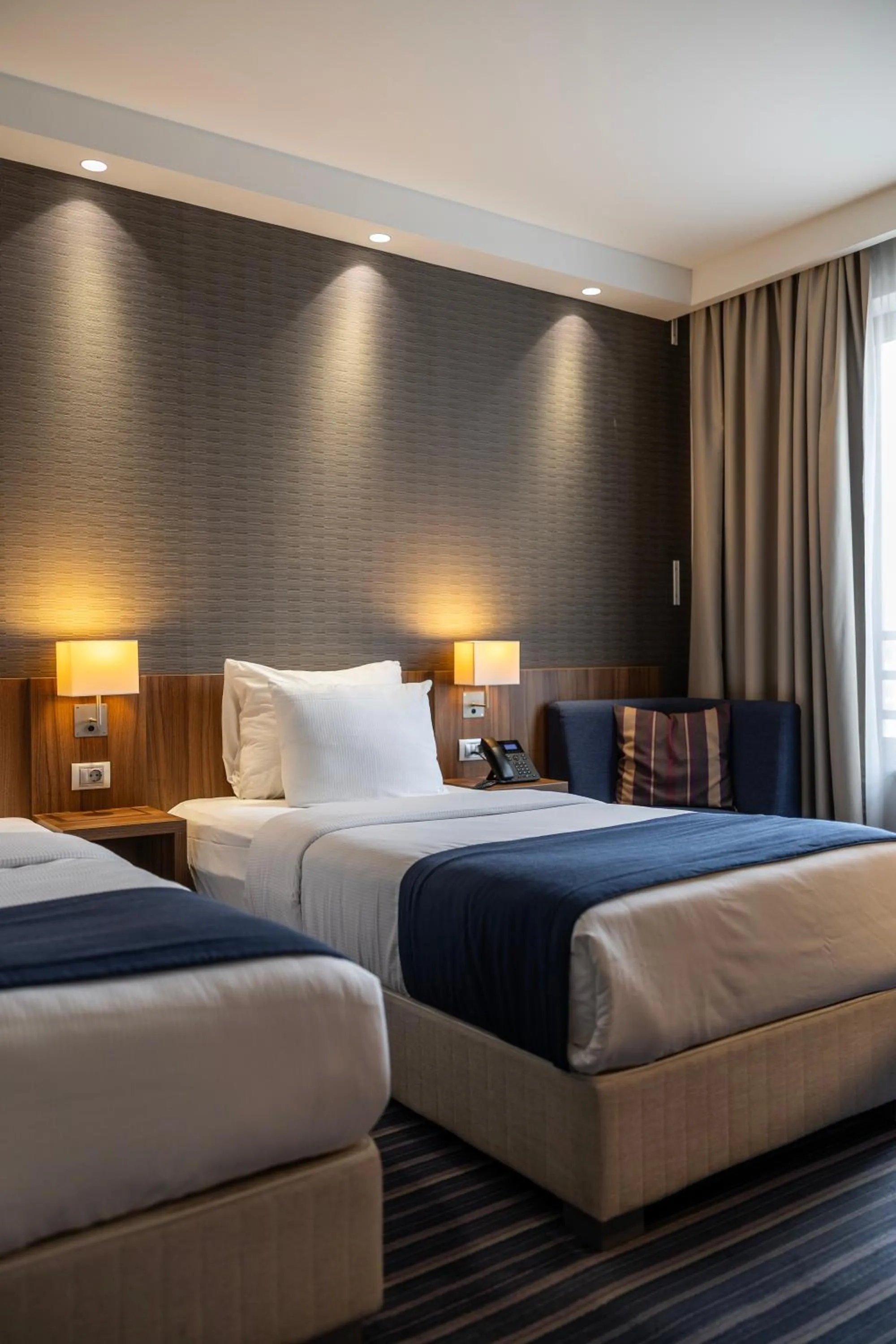 Bed in Nobel Palace Hotel