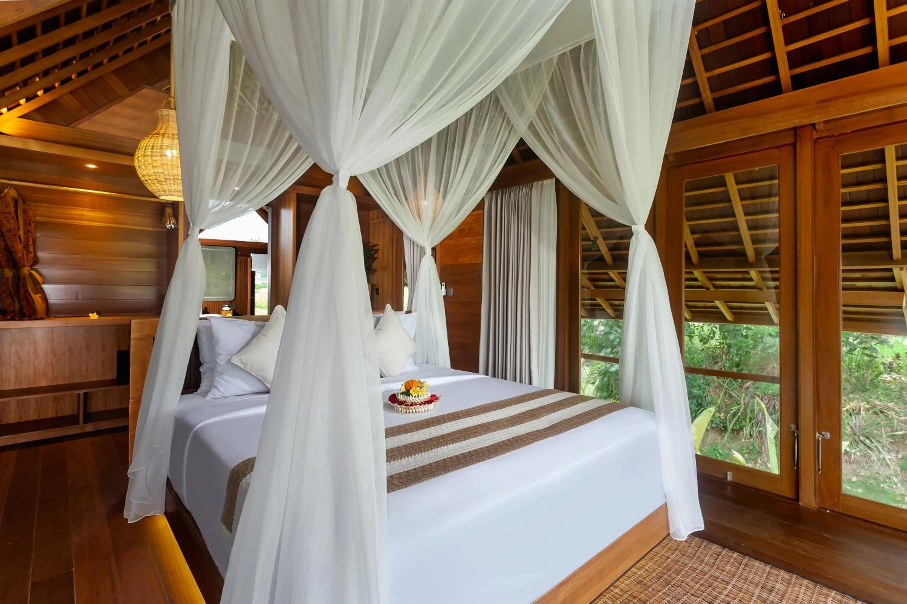 Bed in The Pulu Villas by GenuineHost