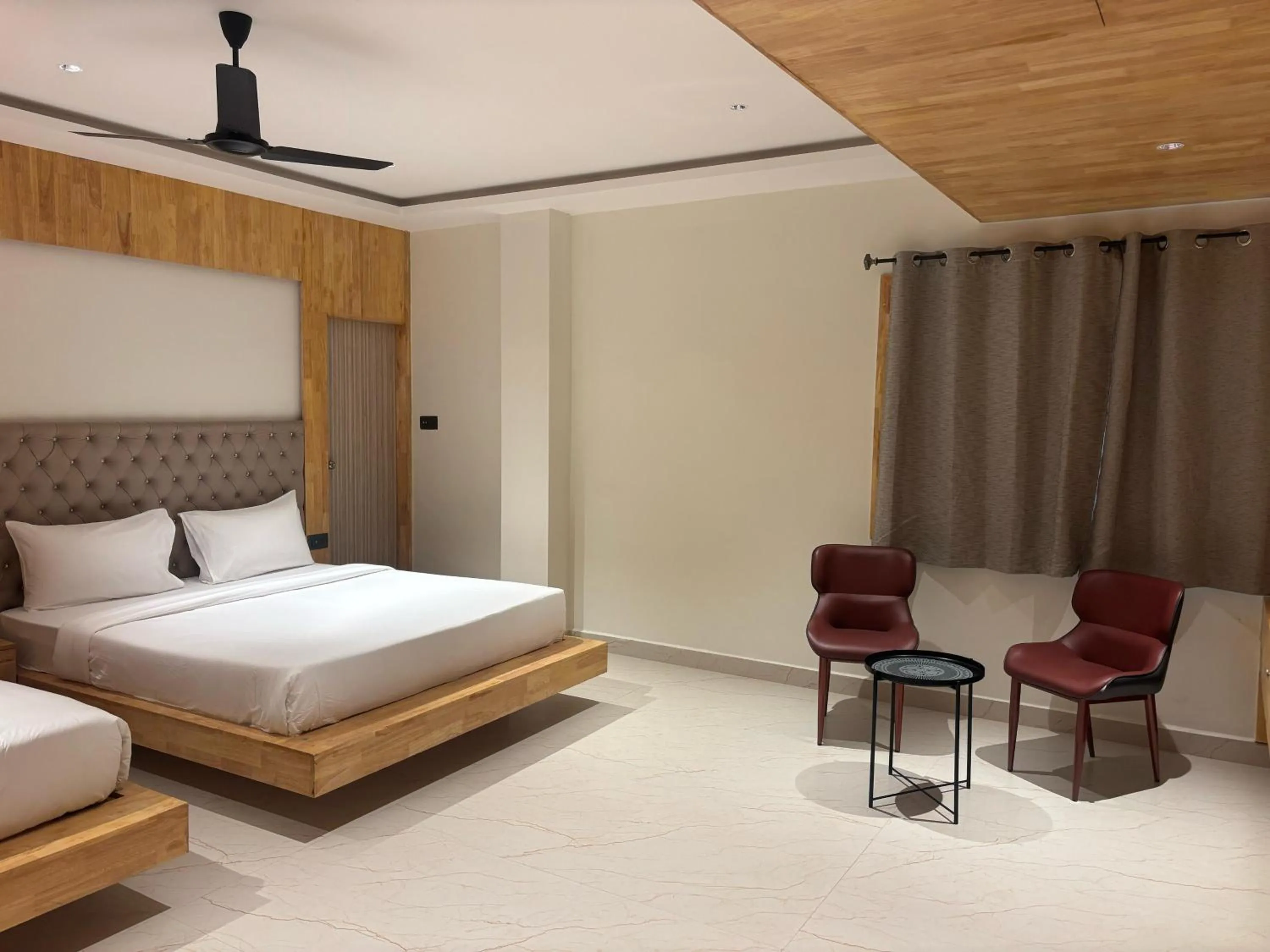 Photo of the whole room, Bed in Anantharaa Hotel