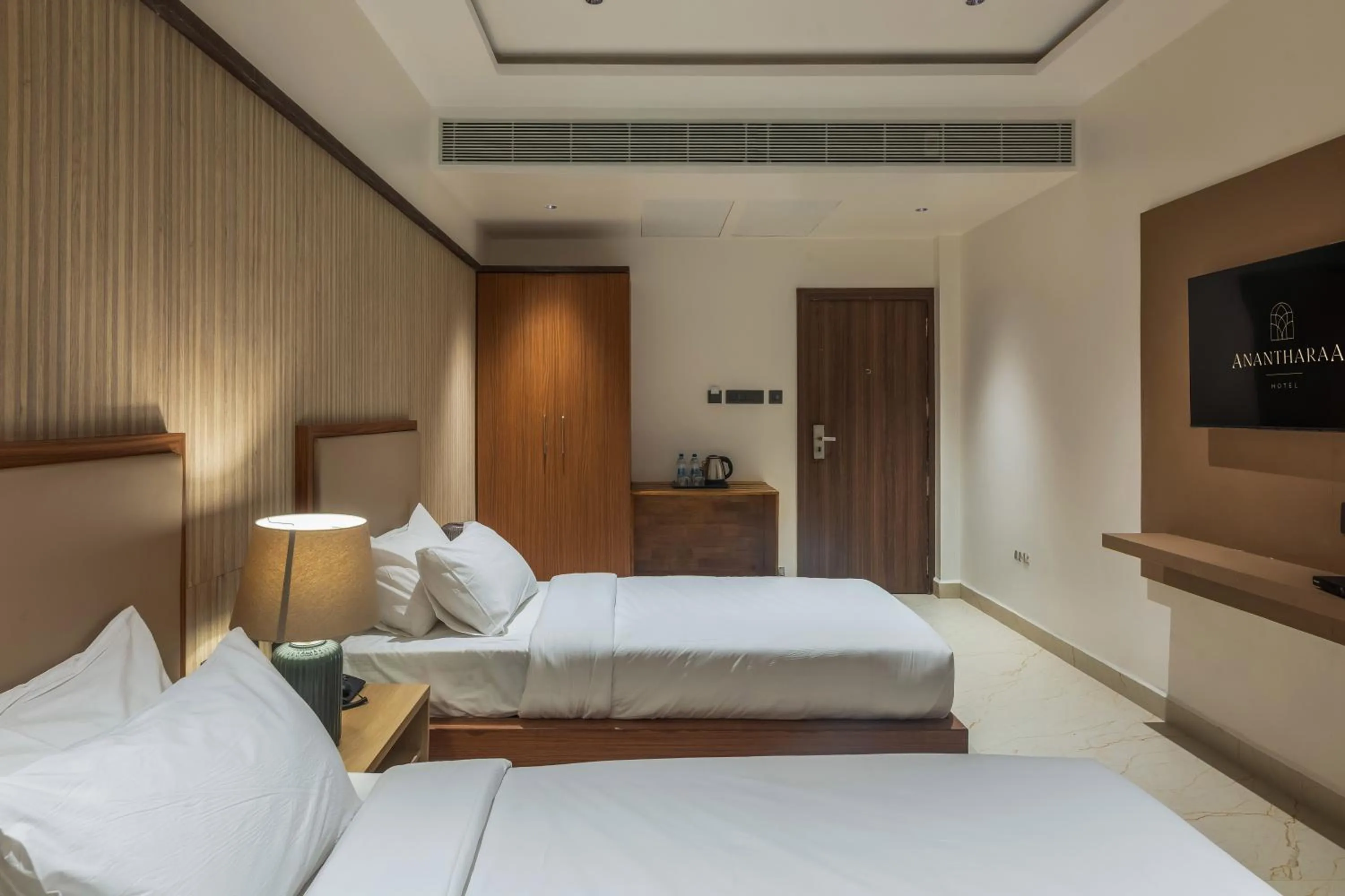 Photo of the whole room, Bed in Anantharaa Hotel