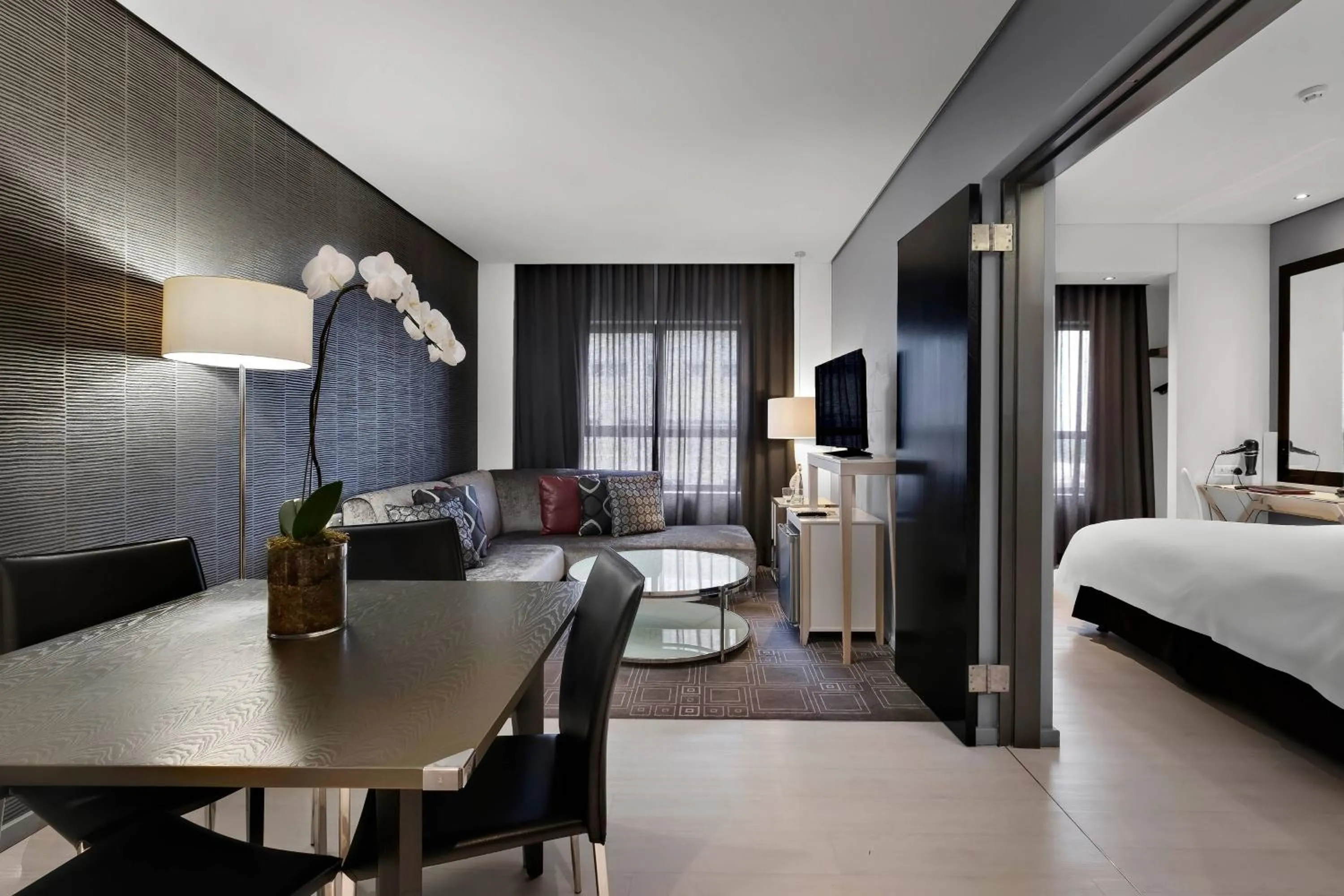 Living room, Bed in Protea Hotel Fire & Ice! by Marriott Pretoria Menlyn