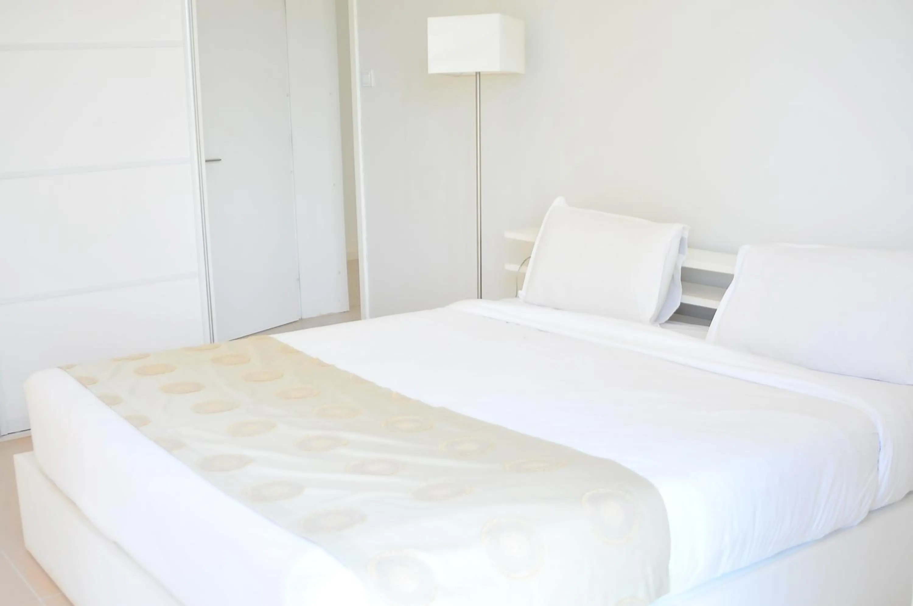 Bed in The Seventeen Apartment Hotel