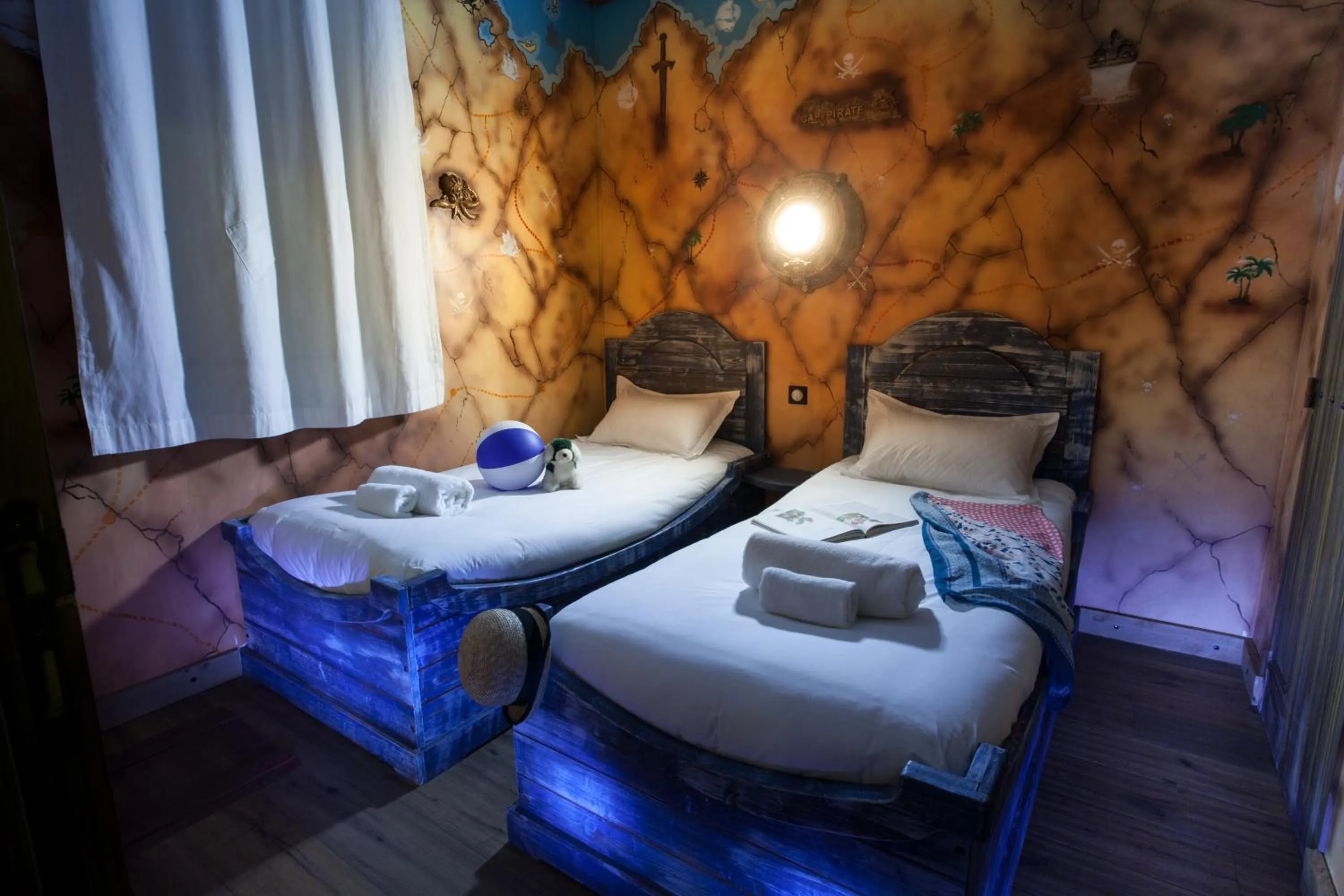 Bed in Hôtel Cap Pirate