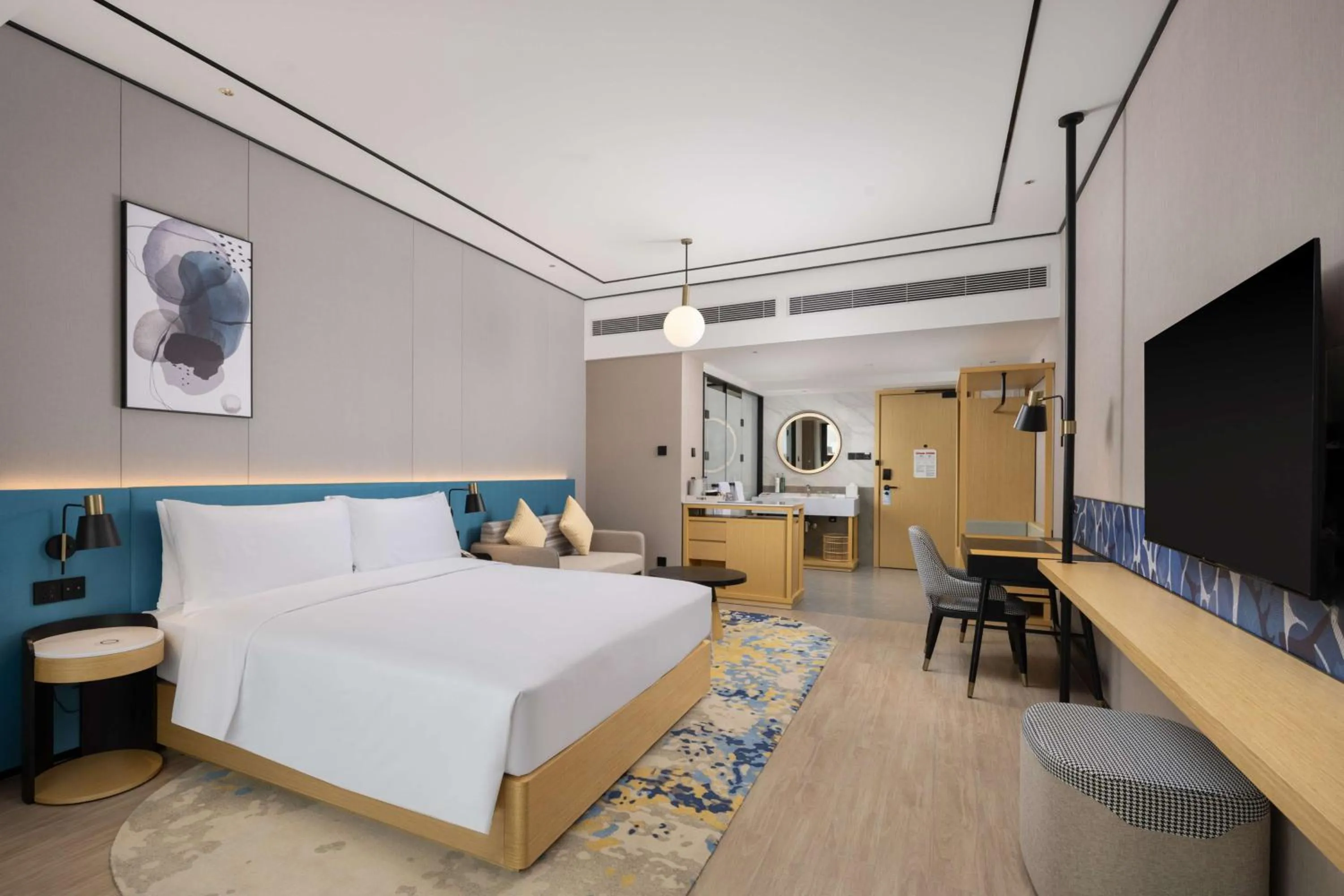 Living room, Bed in Hilton Garden Inn Zhoukou Huaiyang