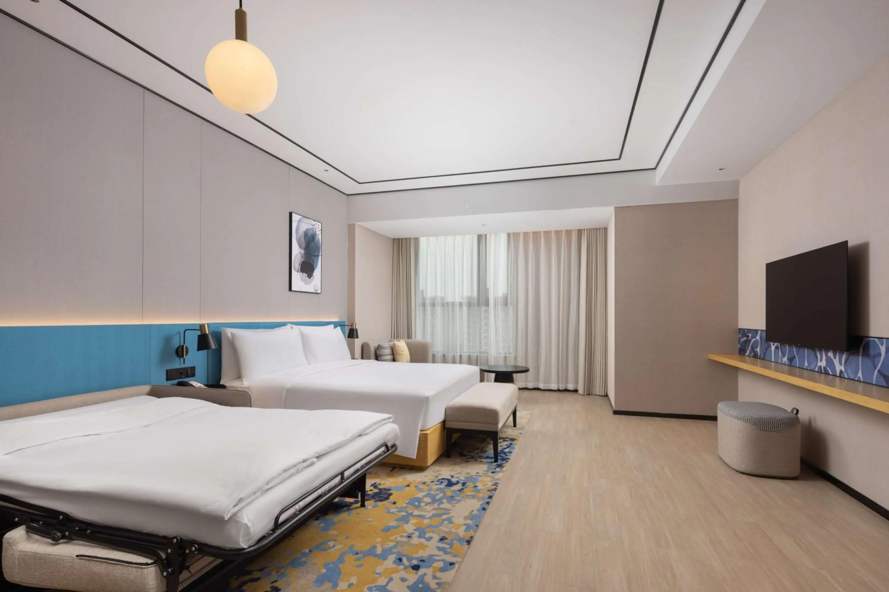 Living room, Bed in Hilton Garden Inn Zhoukou Huaiyang