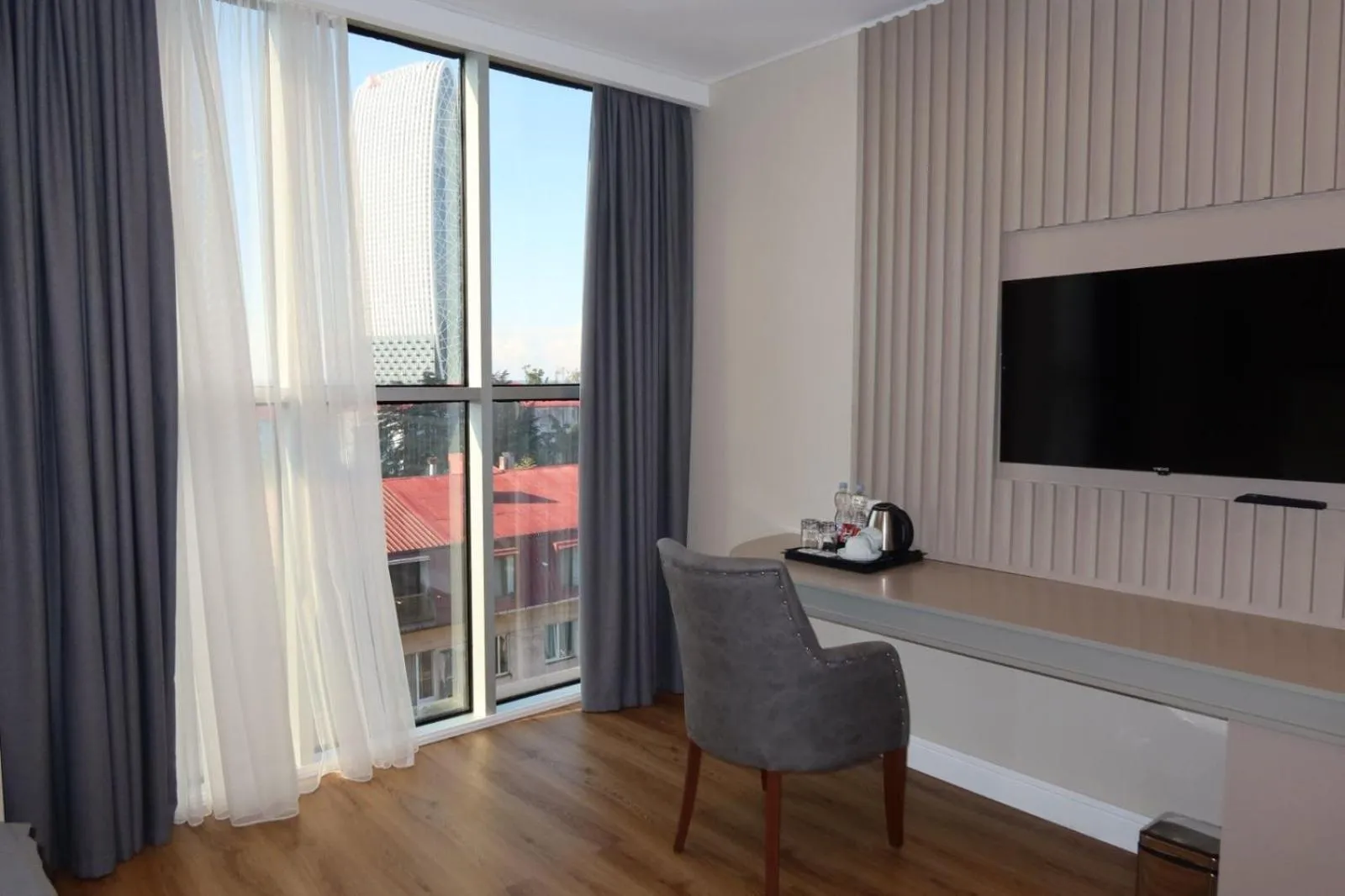 Communal lounge/ TV room in Era Palace Batumi