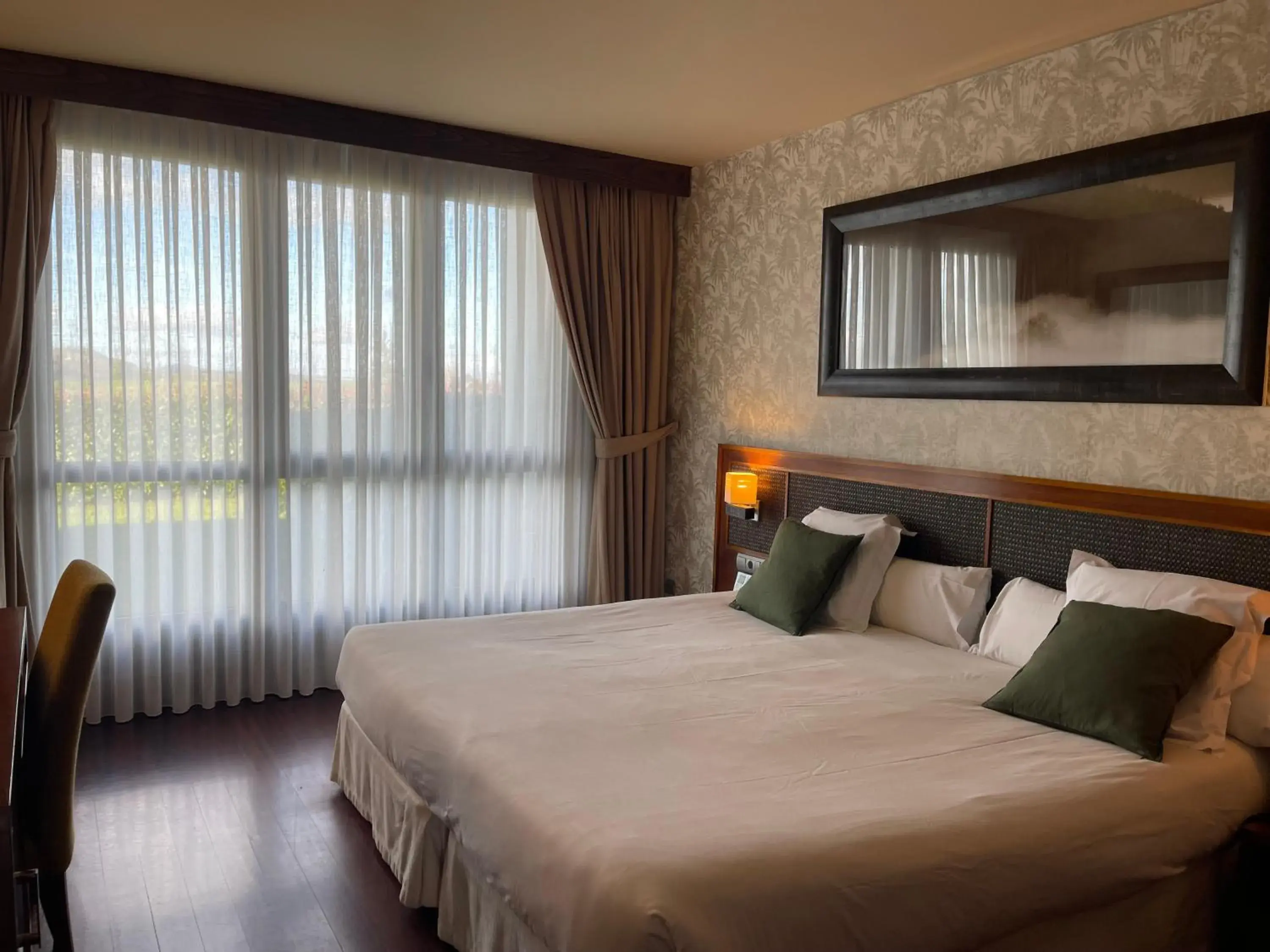 Bedroom, Bed in Hosteria de Torazo Nature Hotel & Spa Bedroom, Bed in Hosteria de Torazo Nature Hotel & Spa