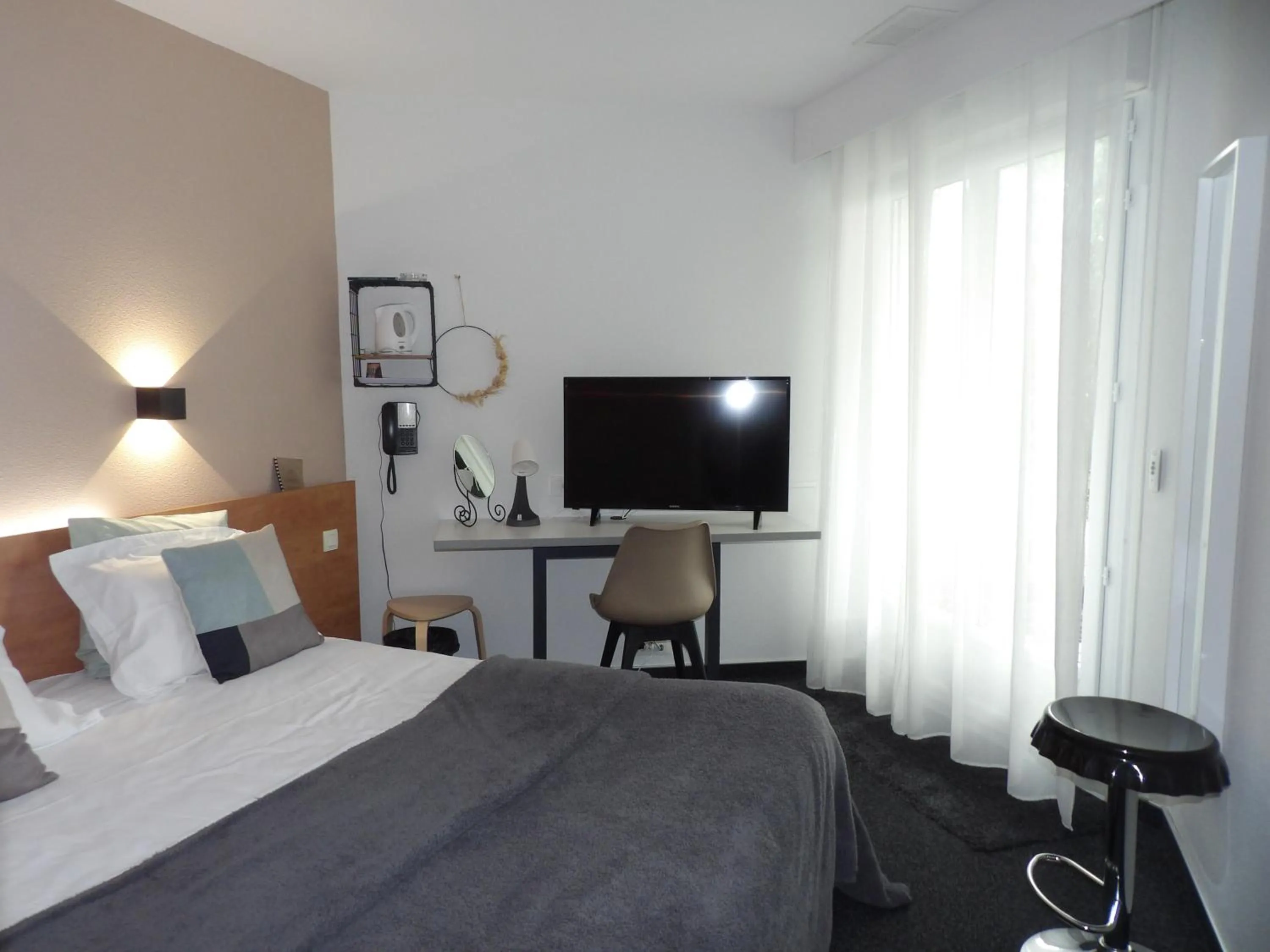 Standard Double or Twin Room with Garden View - single occupancy in Logis Hotel Restaurant Le Jardin Délice