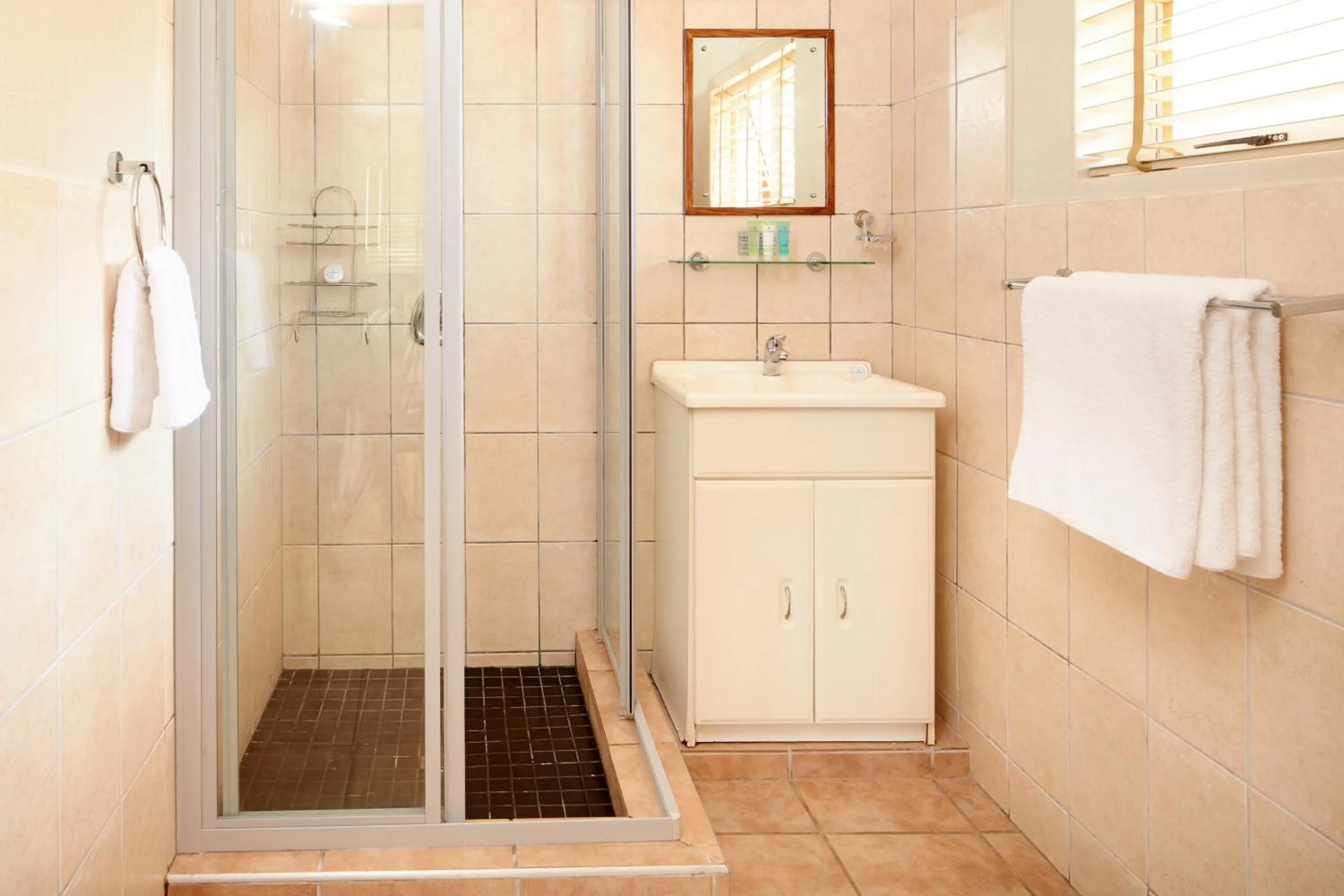 Shower in First Group Chaka's Rock Chalets