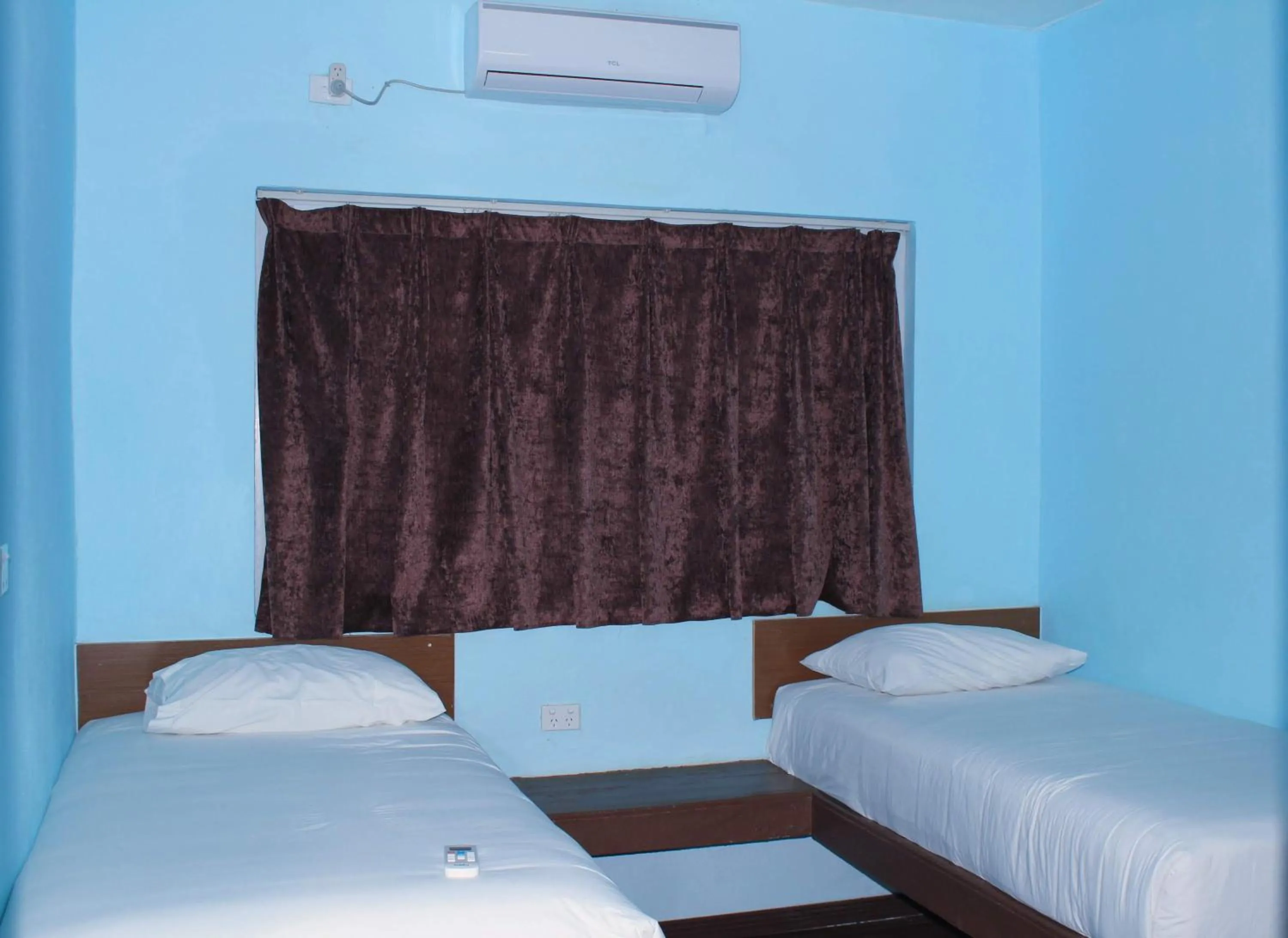 Bed in Blue West Villas