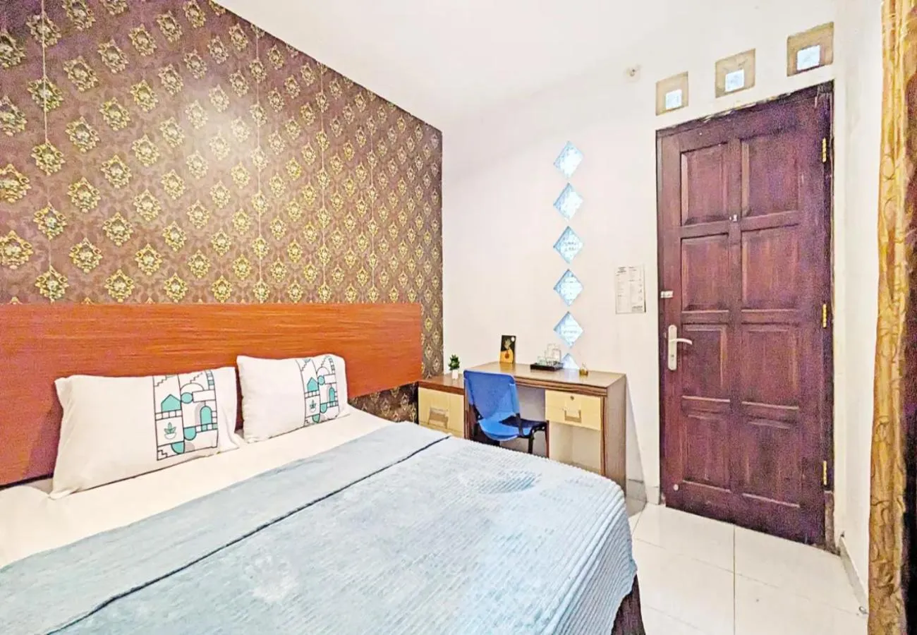 Bed in 99 Guest House