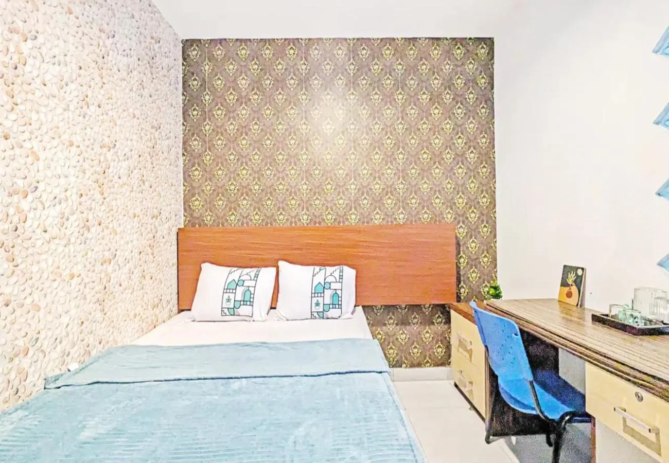 Bed in 99 Guest House