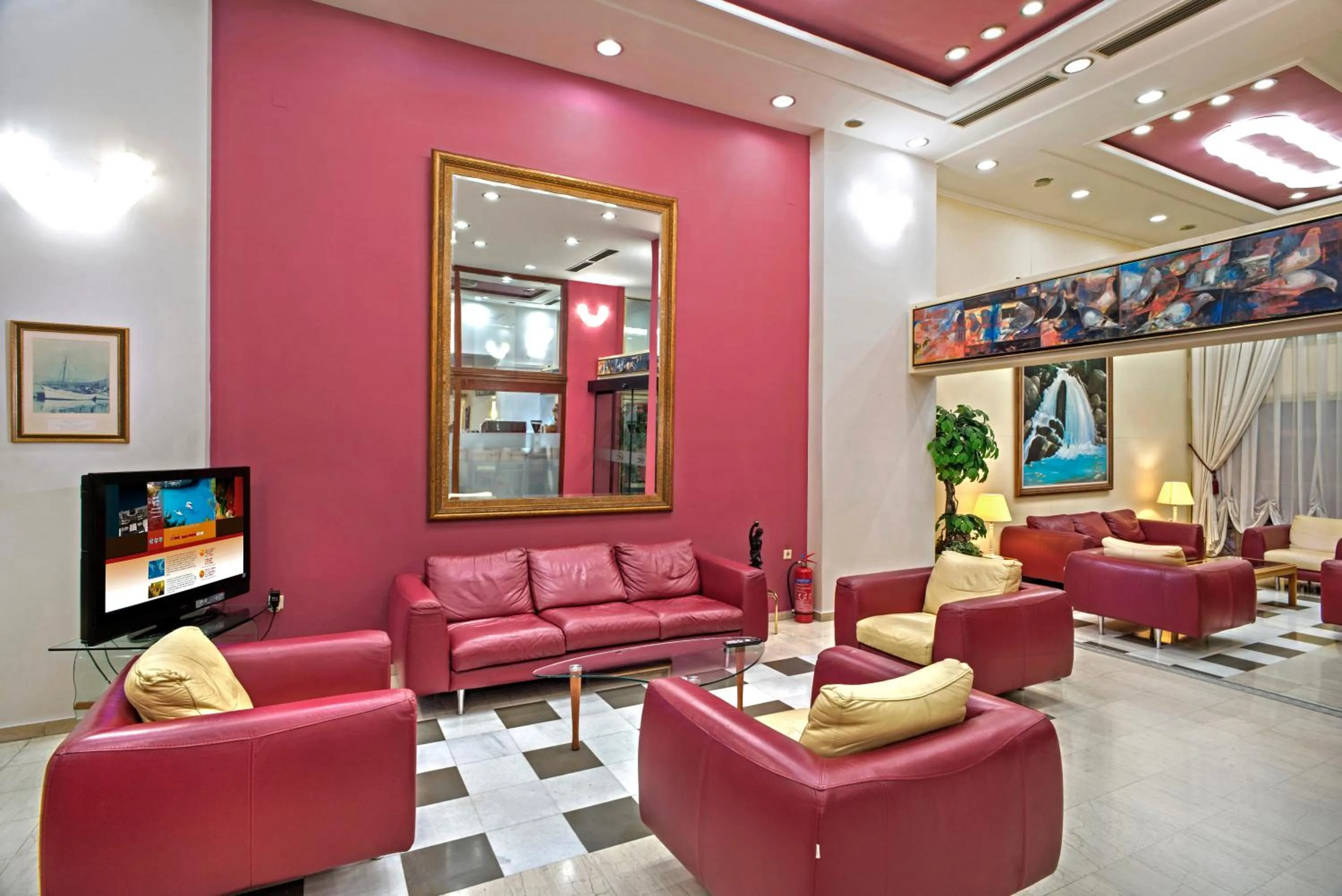 Communal lounge/ TV room in Angelika Pallas Hotel