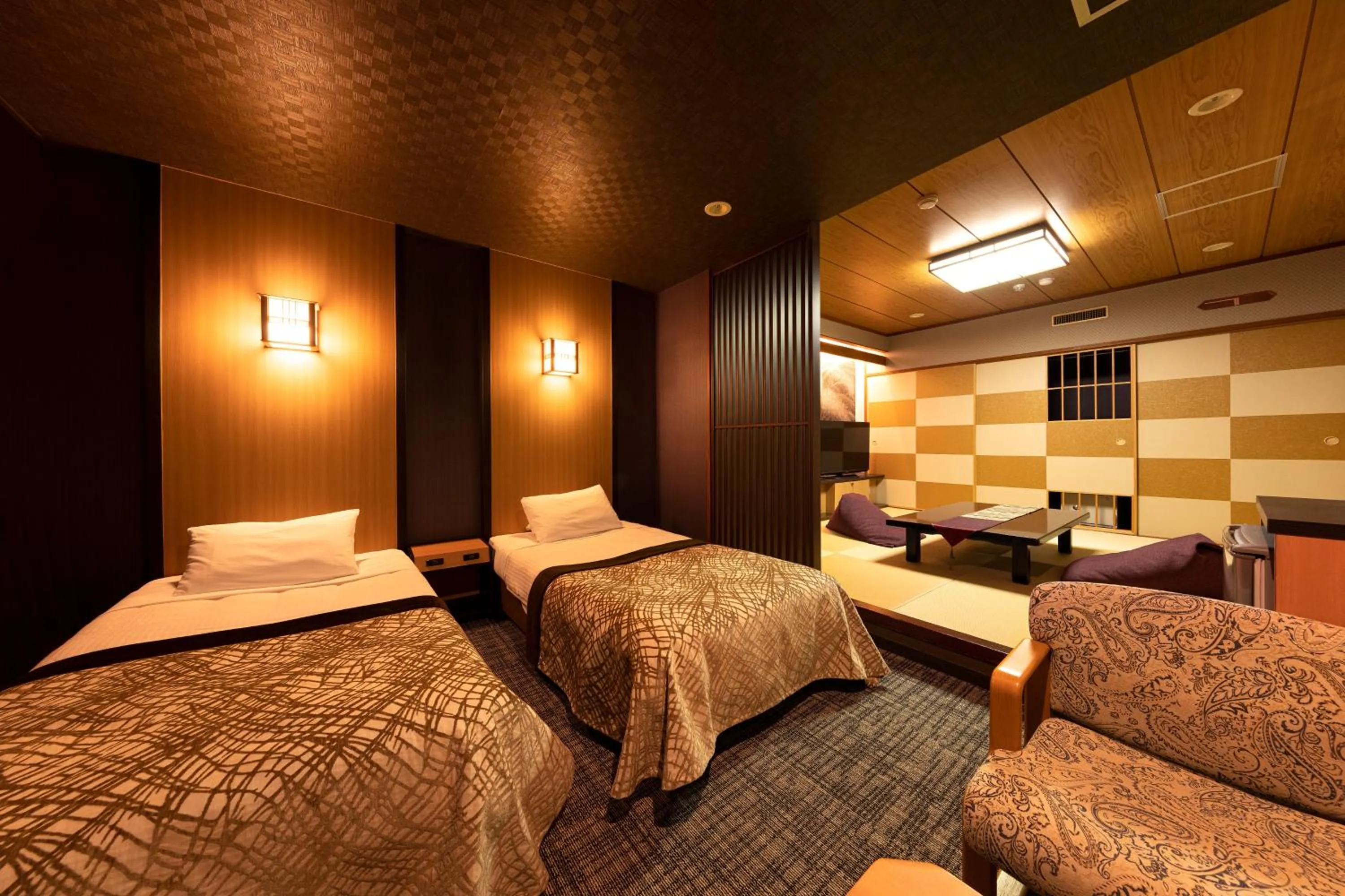 Bed in Tsuetate Onsen Hotel Hizenya