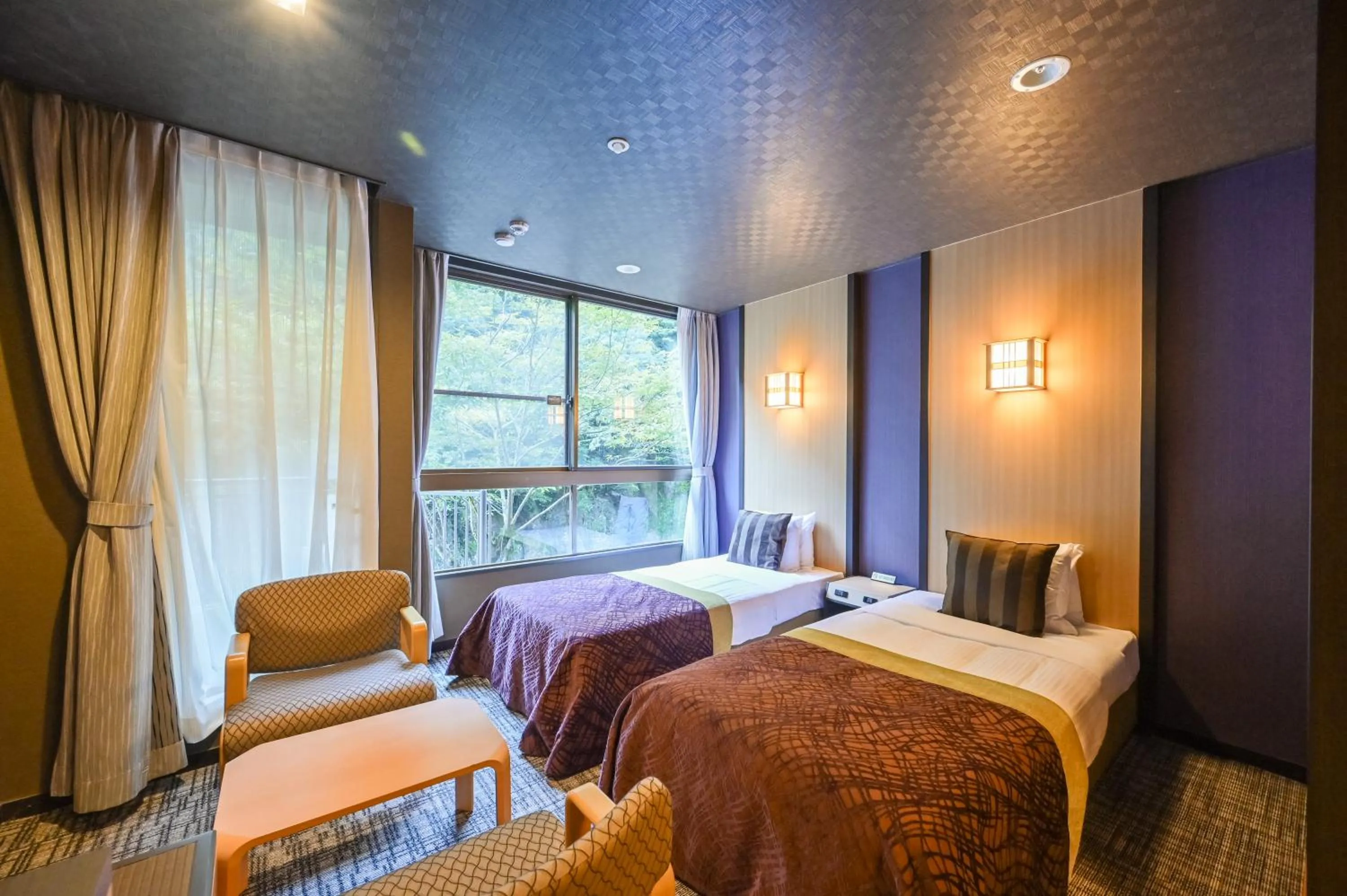 Bed in Tsuetate Onsen Hotel Hizenya