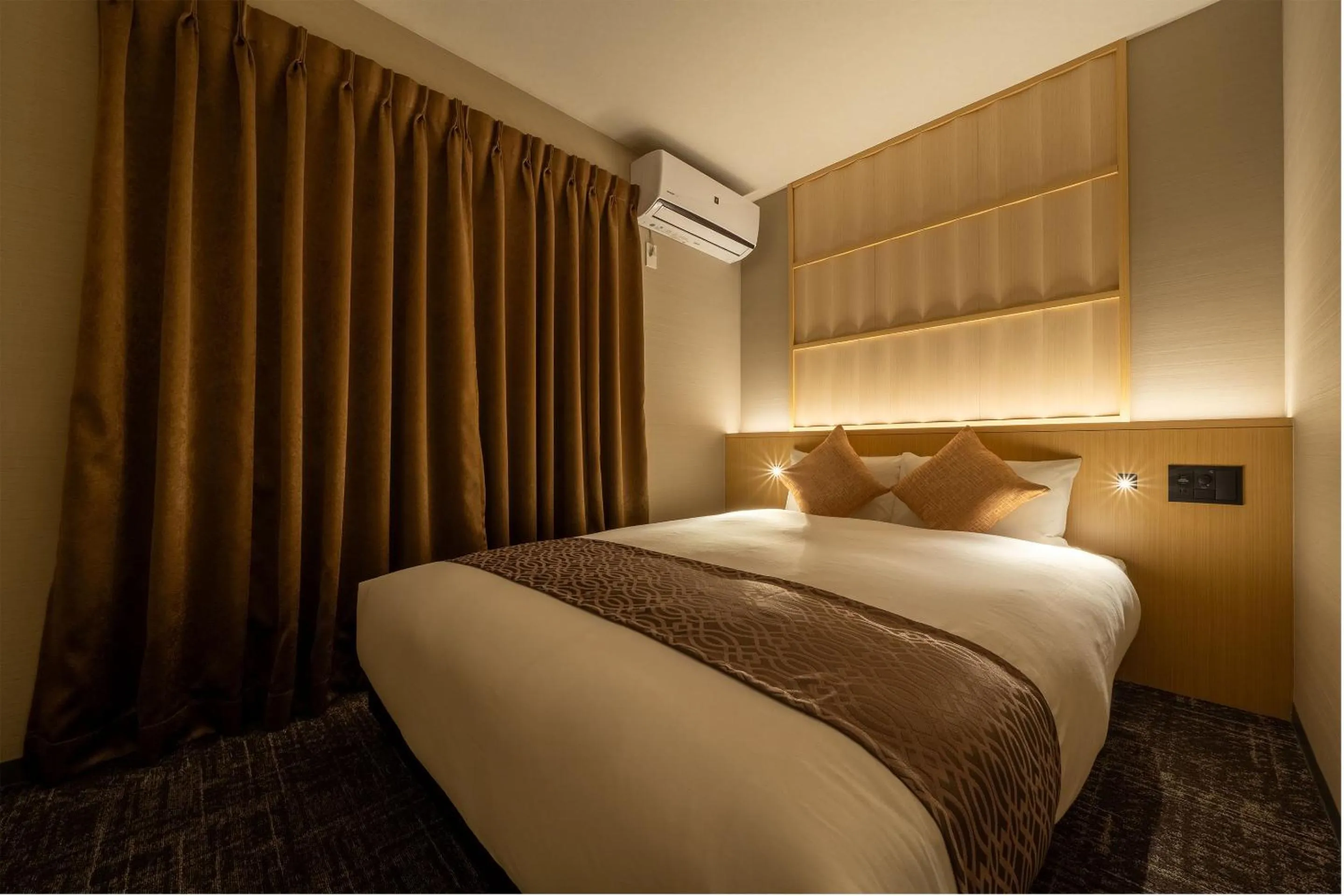 Bed in RESI STAY Kuon