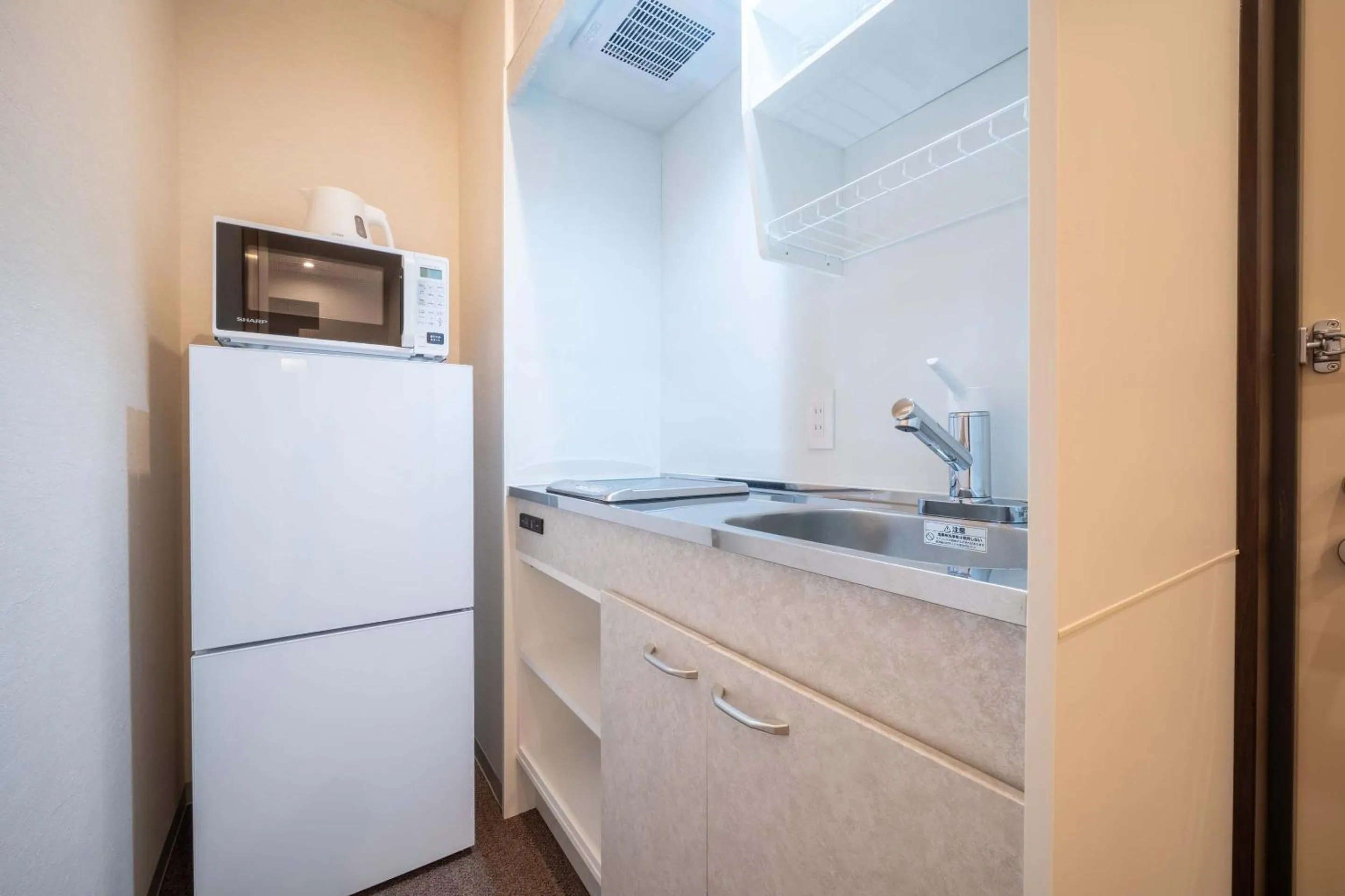 Kitchen or kitchenette in RESI STAY Kuon