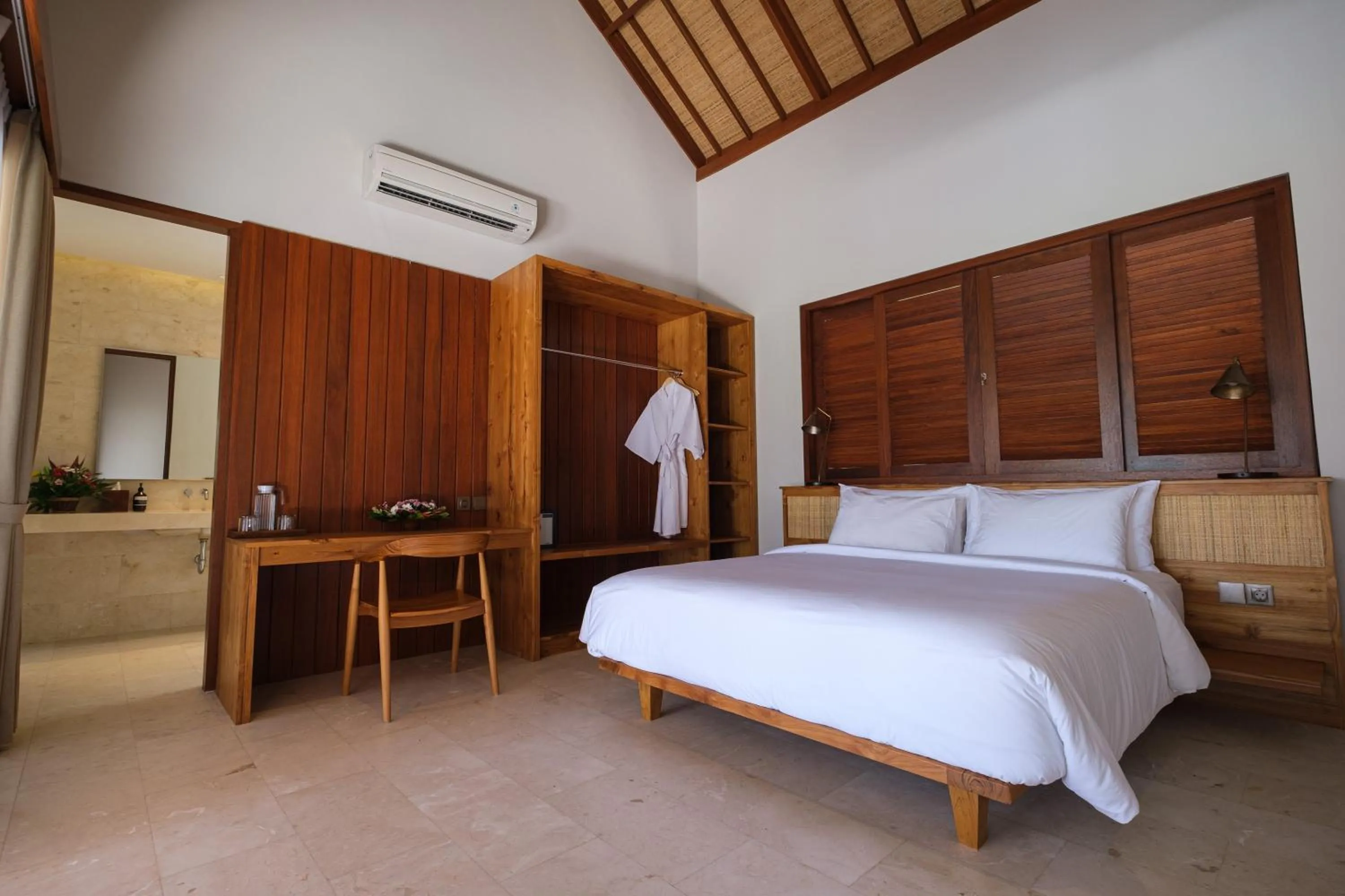 Bed in Amarta Beach Retreat by Nakula