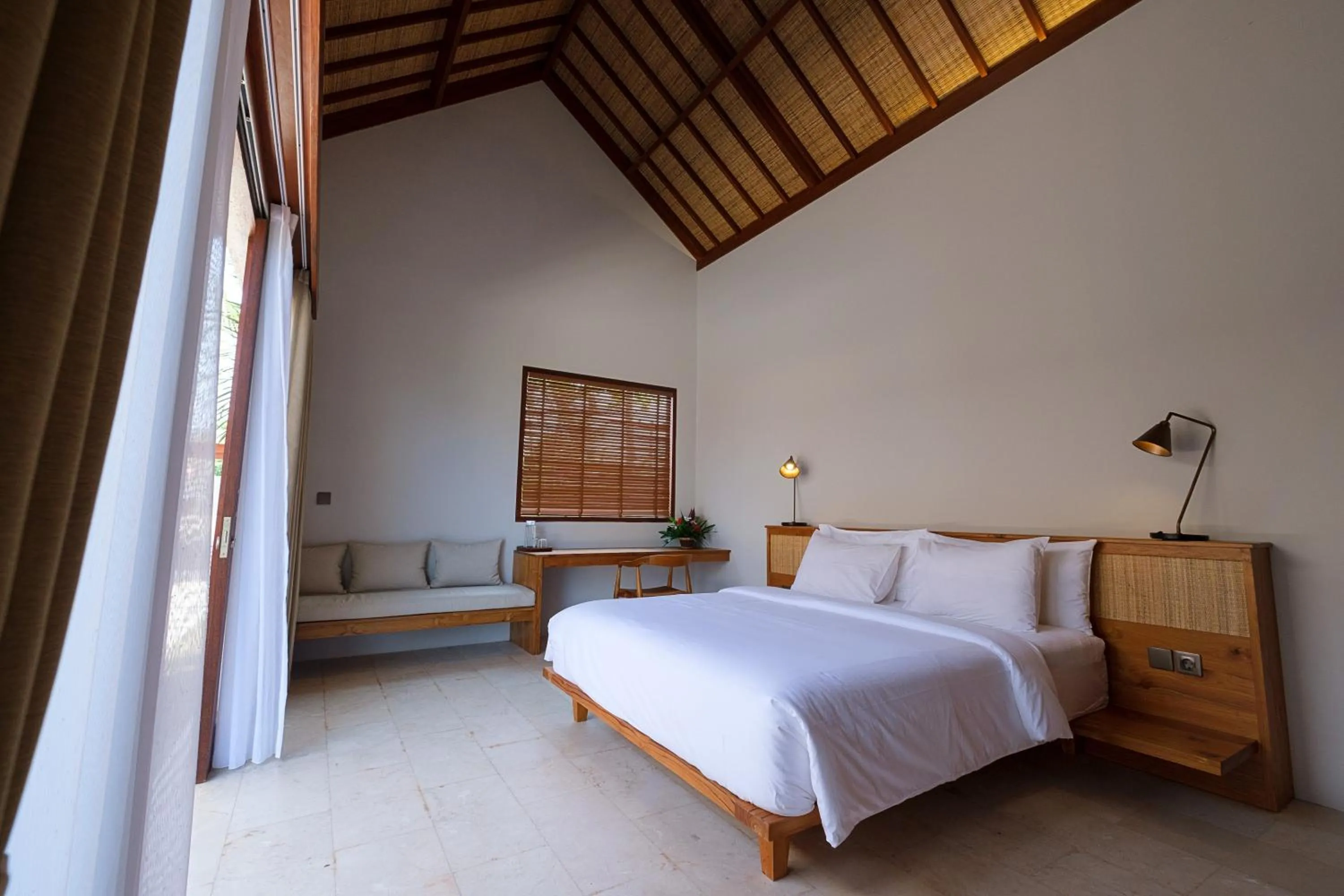 Bed in Amarta Beach Retreat by Nakula