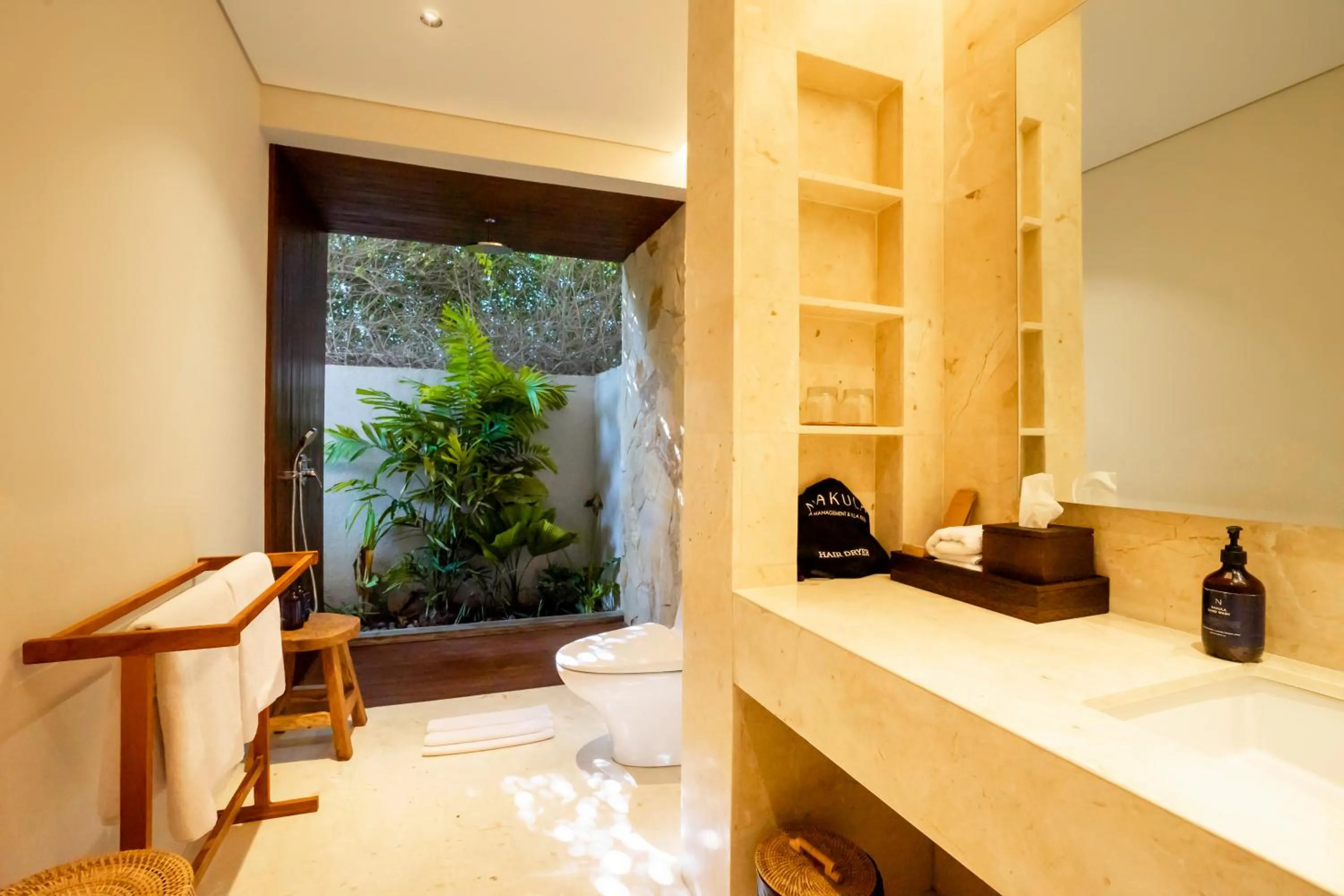 Bathroom in Amarta Beach Retreat by Nakula