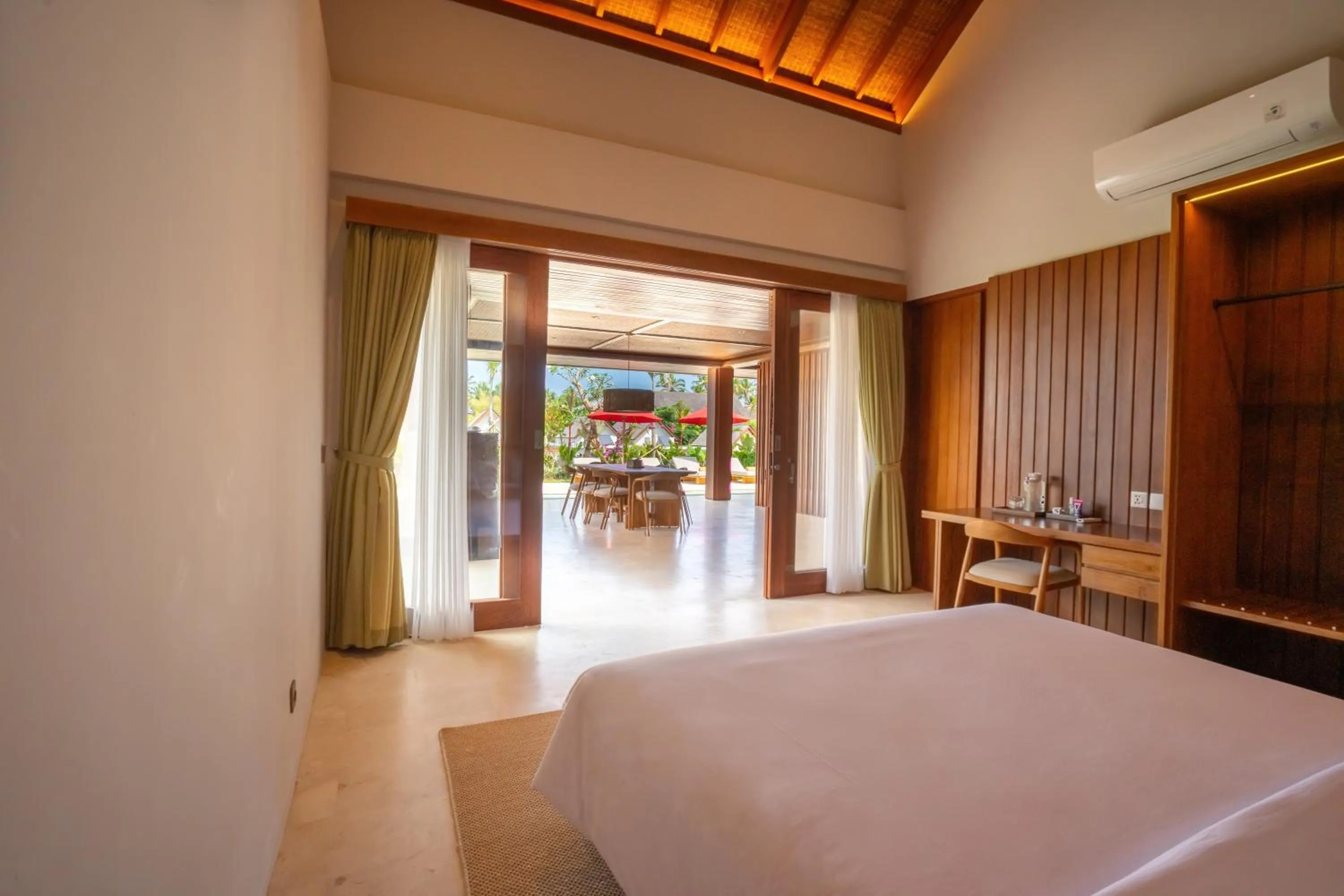 Bed in Amarta Beach Retreat by Nakula