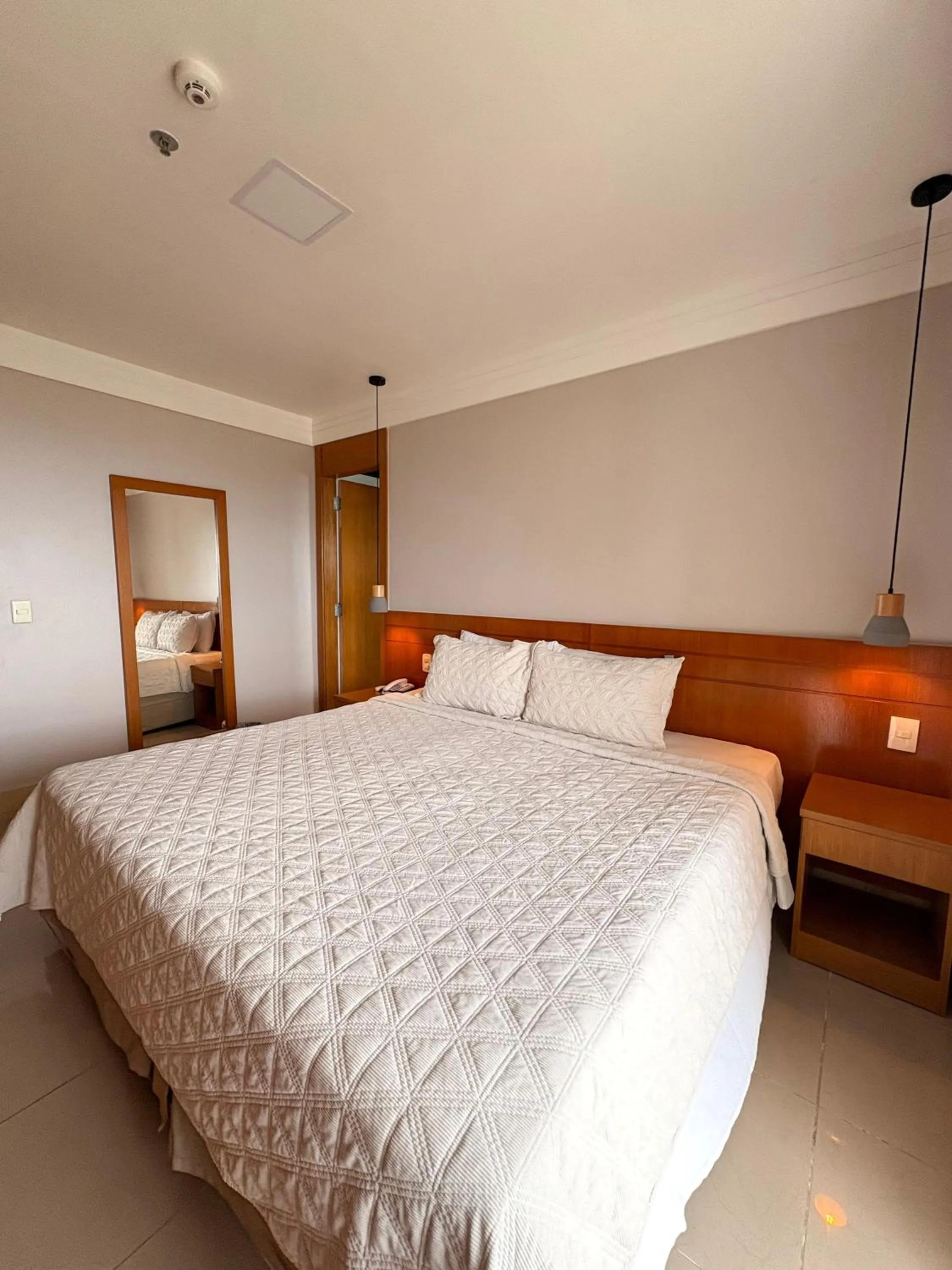 Bed in Royal Urban Macaé Hotel