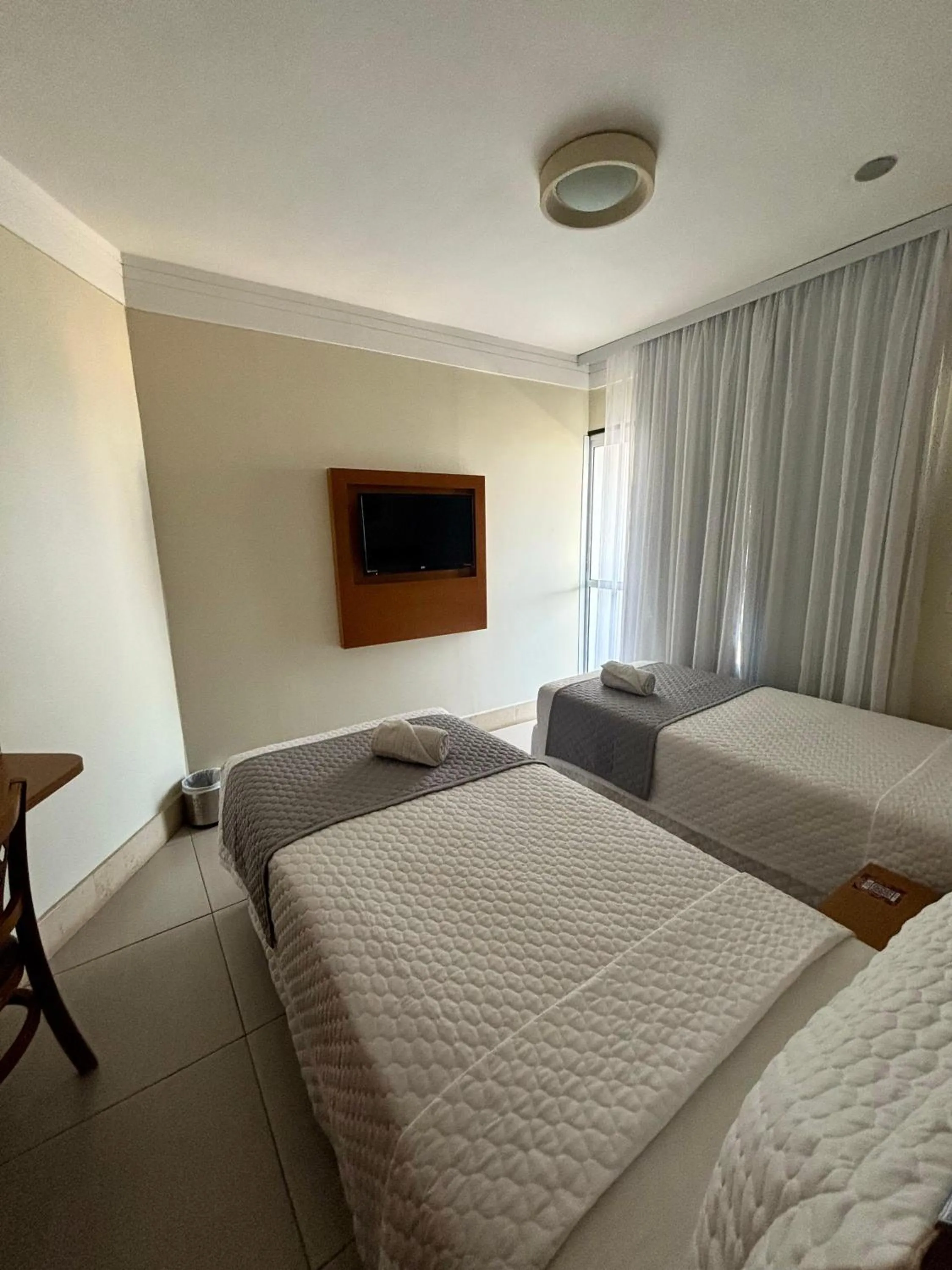 Bed in Royal Urban Macaé Hotel