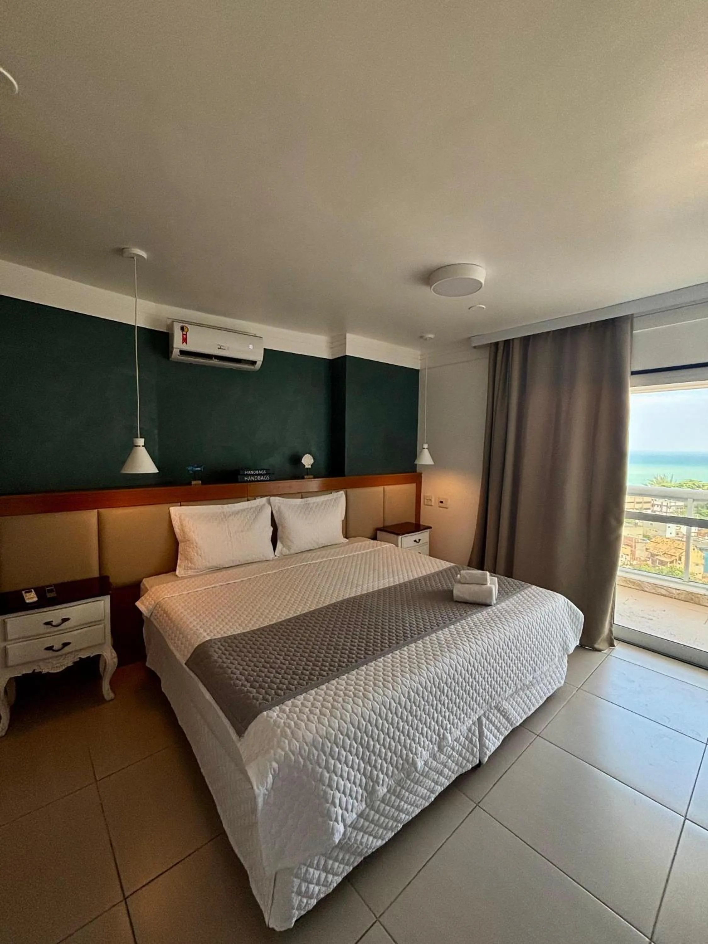 Balcony/Terrace, Bed in Royal Urban Macaé Hotel